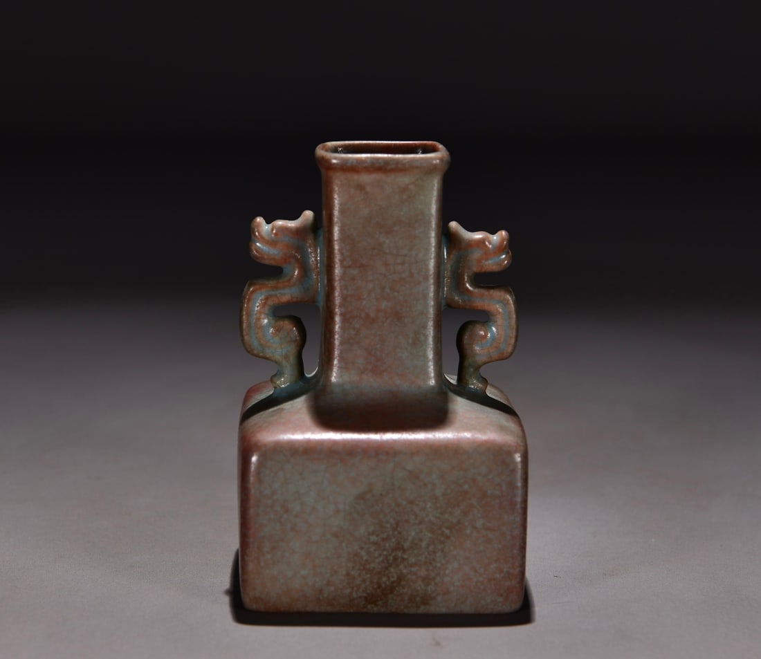 Formerly in the collection of a Song Dynasty Ru ware celadon square double-eared vase: A Song Dynasty Ru ware celadon square vase with two handles, formerly in my collection. Dimensions: Height 11 cm, Width 7 cm. Provenance:Private collection, Hamburg, Germany. Our cooperative logistics