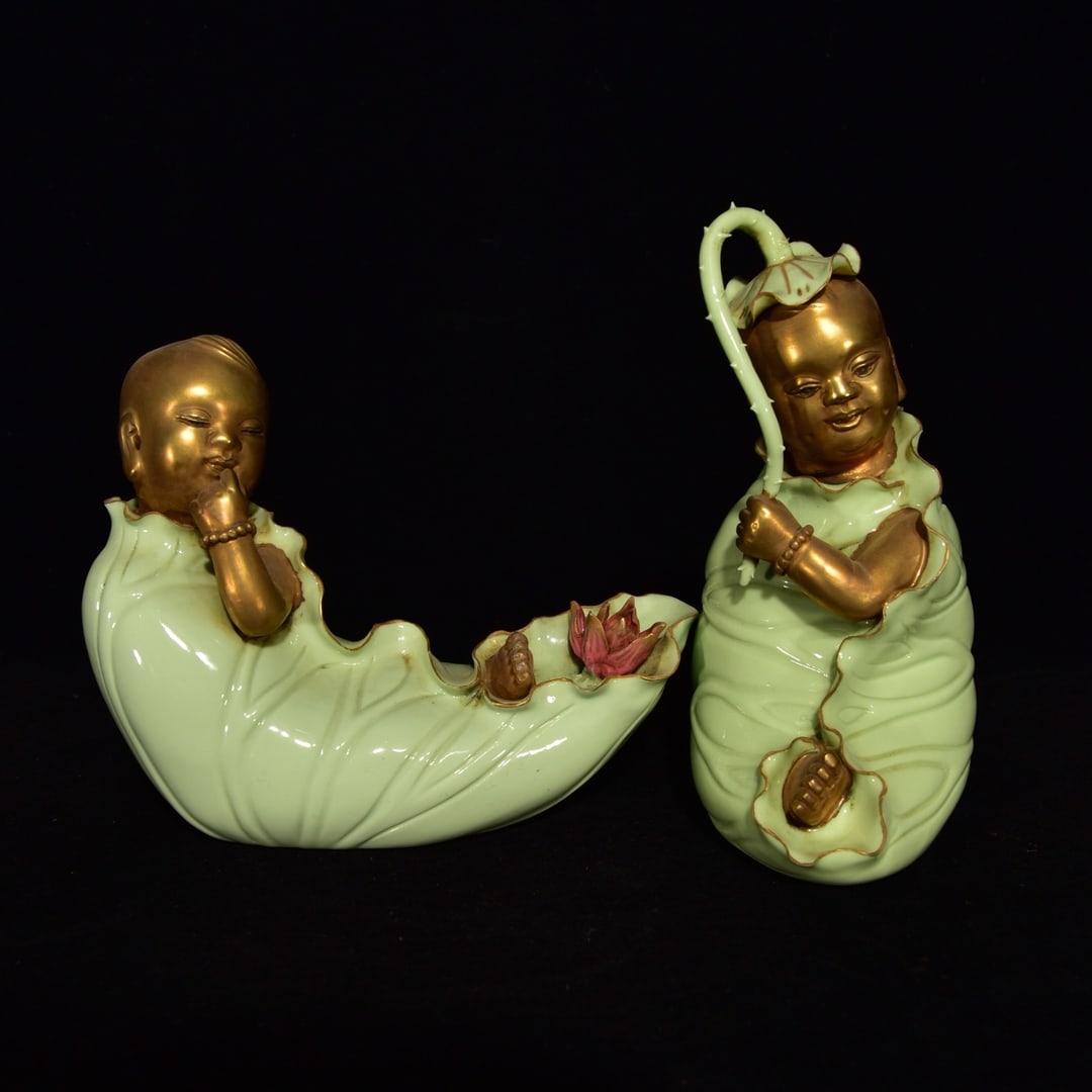 Celadon glaze gilded boy and girl: Qing Dynasty, Qianlong Period, celadon glazed gilt gilt boy and girl figurines, 17.5 x 11 cm Provenance:Private collection, Florence, Italy. Our cooperative logistics services provider expertly handle