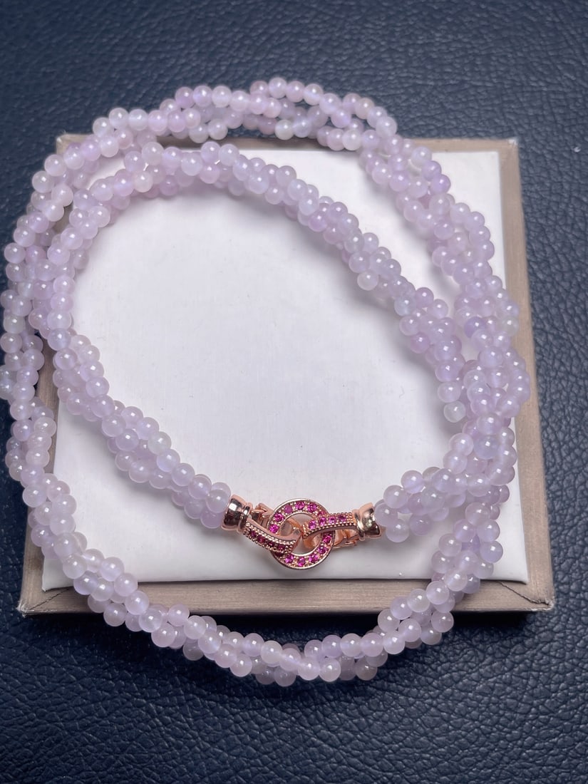 Jadeite Icy Light Purple Three-Strand Braid Necklace: A light purple, icy jadeite necklace with a three-strand braid design; the jadeite is translucent and lustrous, with each bead full and exquisite. Provenance:from a private collector in Ankara, Turkey