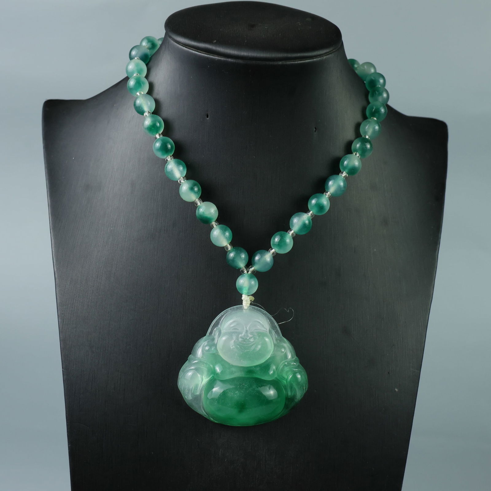 Perfectly crafted, high-quality ice-crystal-colored Maitreya Buddha amulet. (1 of 9)