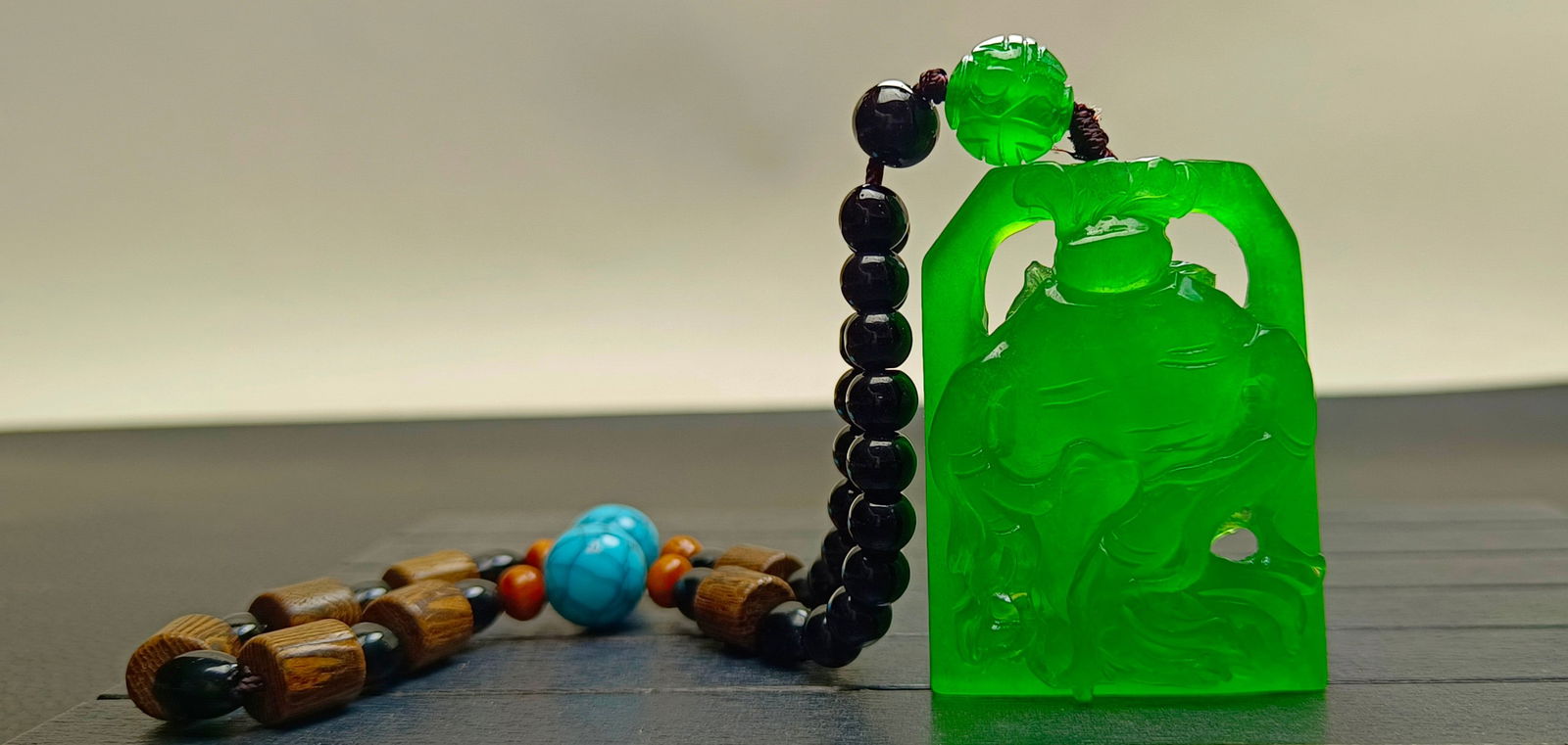 Top-grade dragon stone type imperial green extra-large and extra-thick jadeite ginseng hand-carved: Top-grade imperial green jadeite ginseng hand-carved piece, exceptionally large and thick, with superb translucency. Absolutely perfect, double-sided carving. Provenance:From an old private collection