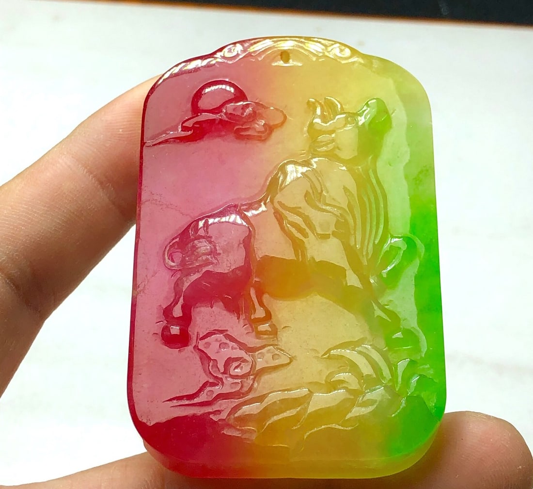 High-Ice Multicolored Jadeite Ox Pendant: High-quality, multi-colored jadeite ox pendant, made from superior material, icy and translucent, with full color and clarity, entirely hand-carved in three-dimensional relief, elegant to wear, comple