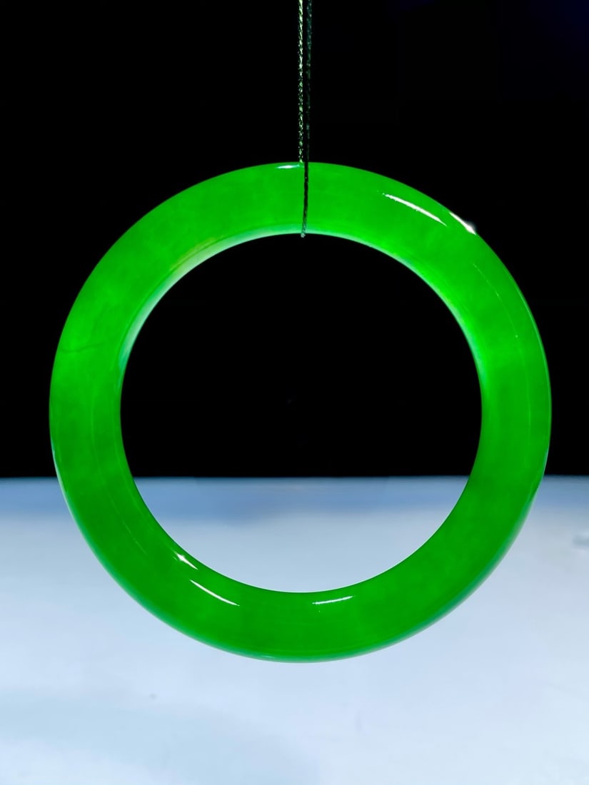 High-Ice Imperial Green Dragon Jadeite Bangle (1 of 6)