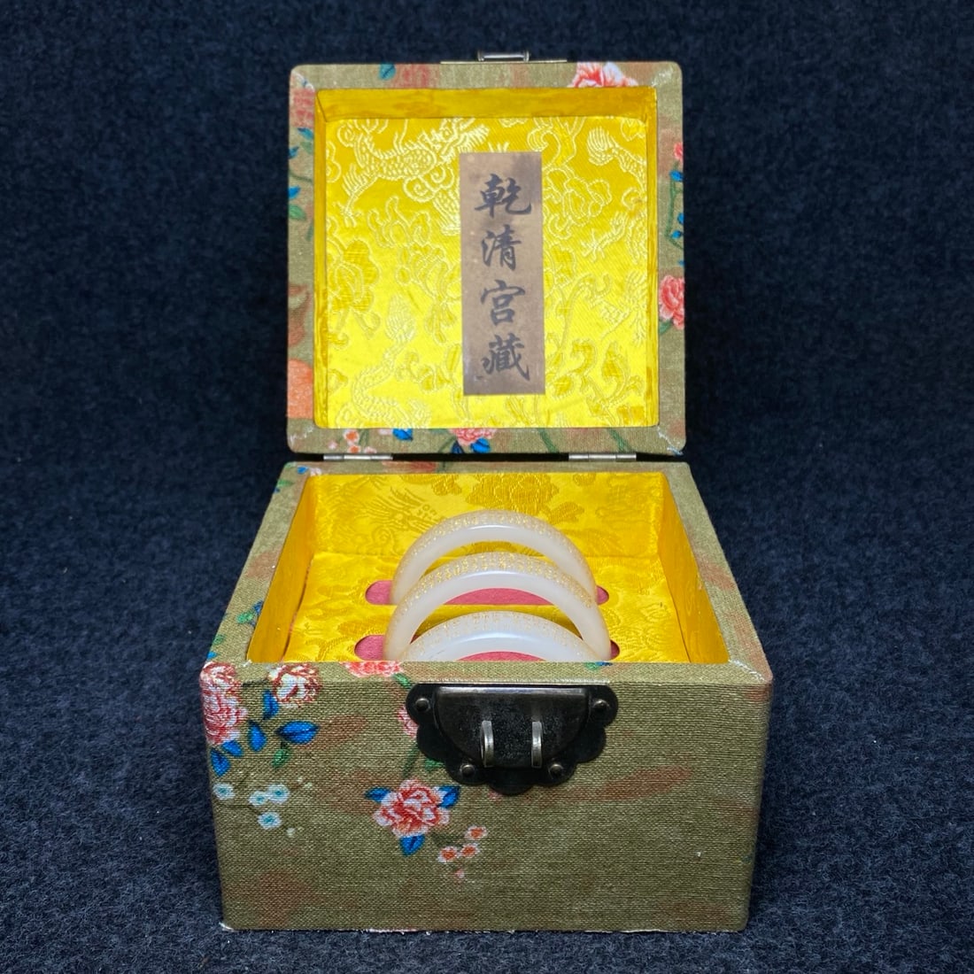 A luminescent bracelet engraved with exquisite craftsmanship, treasured in a royal jewelry box. (1 of 11)