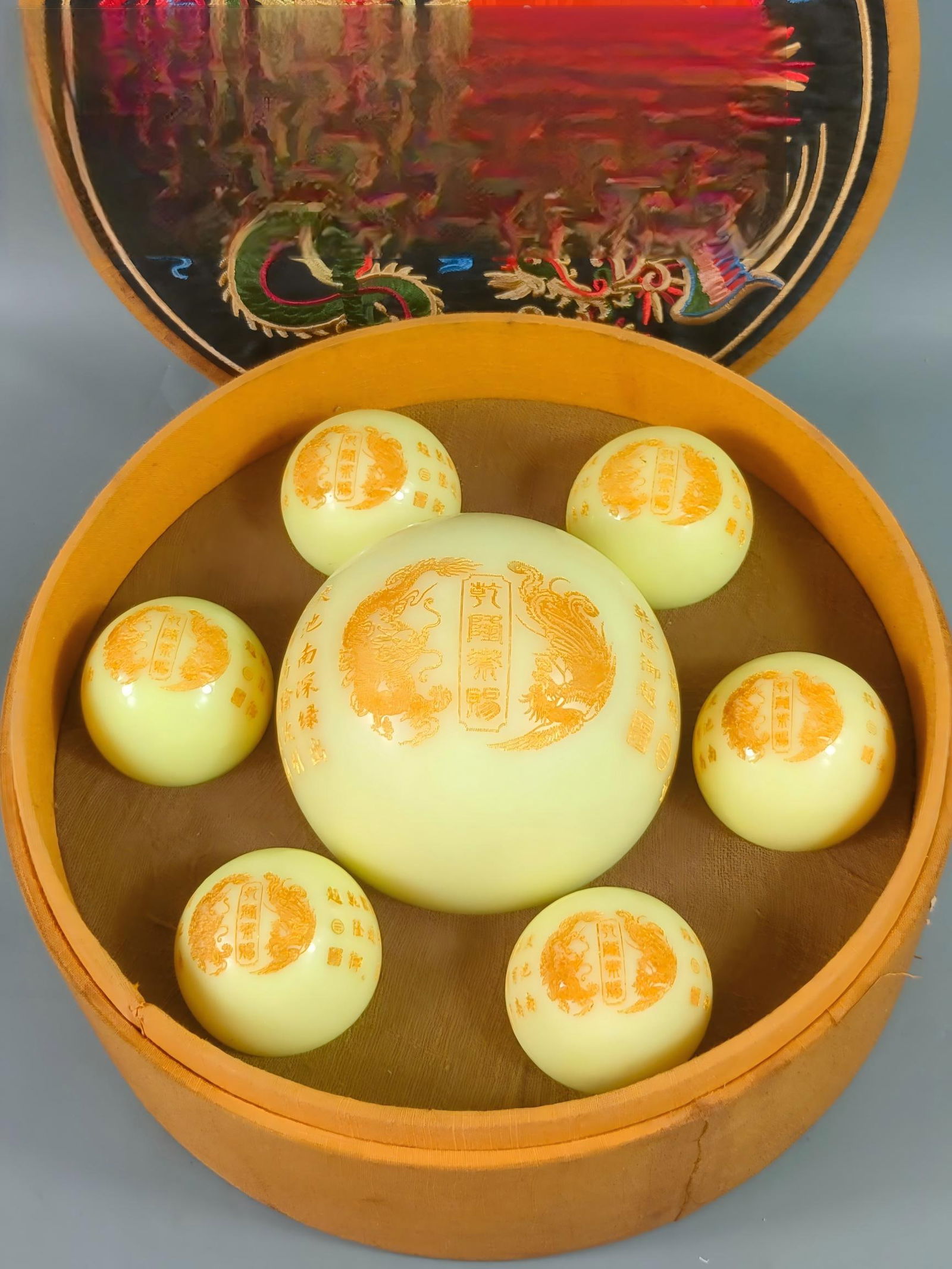 Old embroidered box containing luminous pearl (1 of 9)