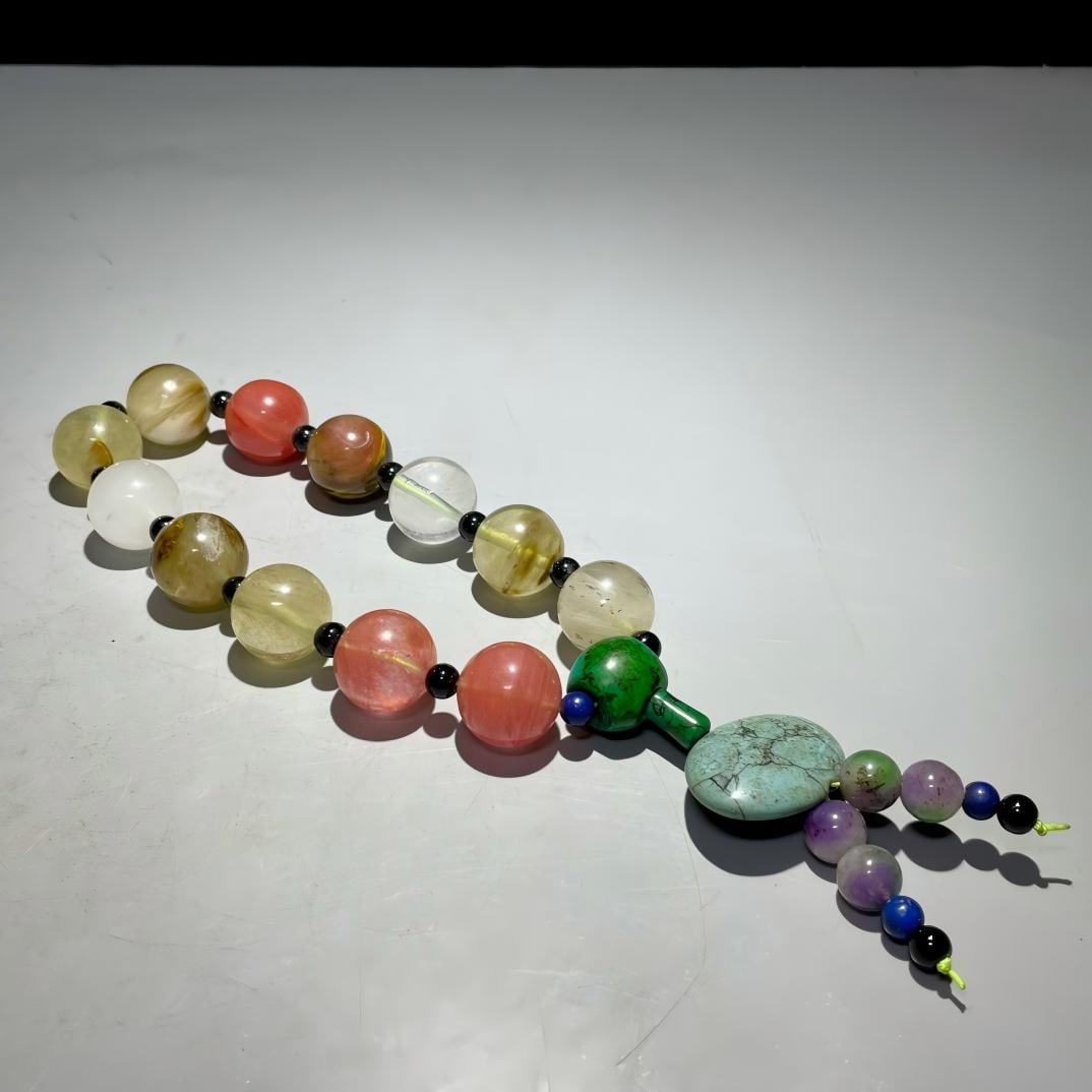 Multi-precious Crystal Hand-held Rosary: Rare multi-gem crystal hand-held prayer beads, 2.4cm in diameter, weighing 235g. Provenance:Private collection, Marseille, France. Our cooperative logistics services provider expertly handles both