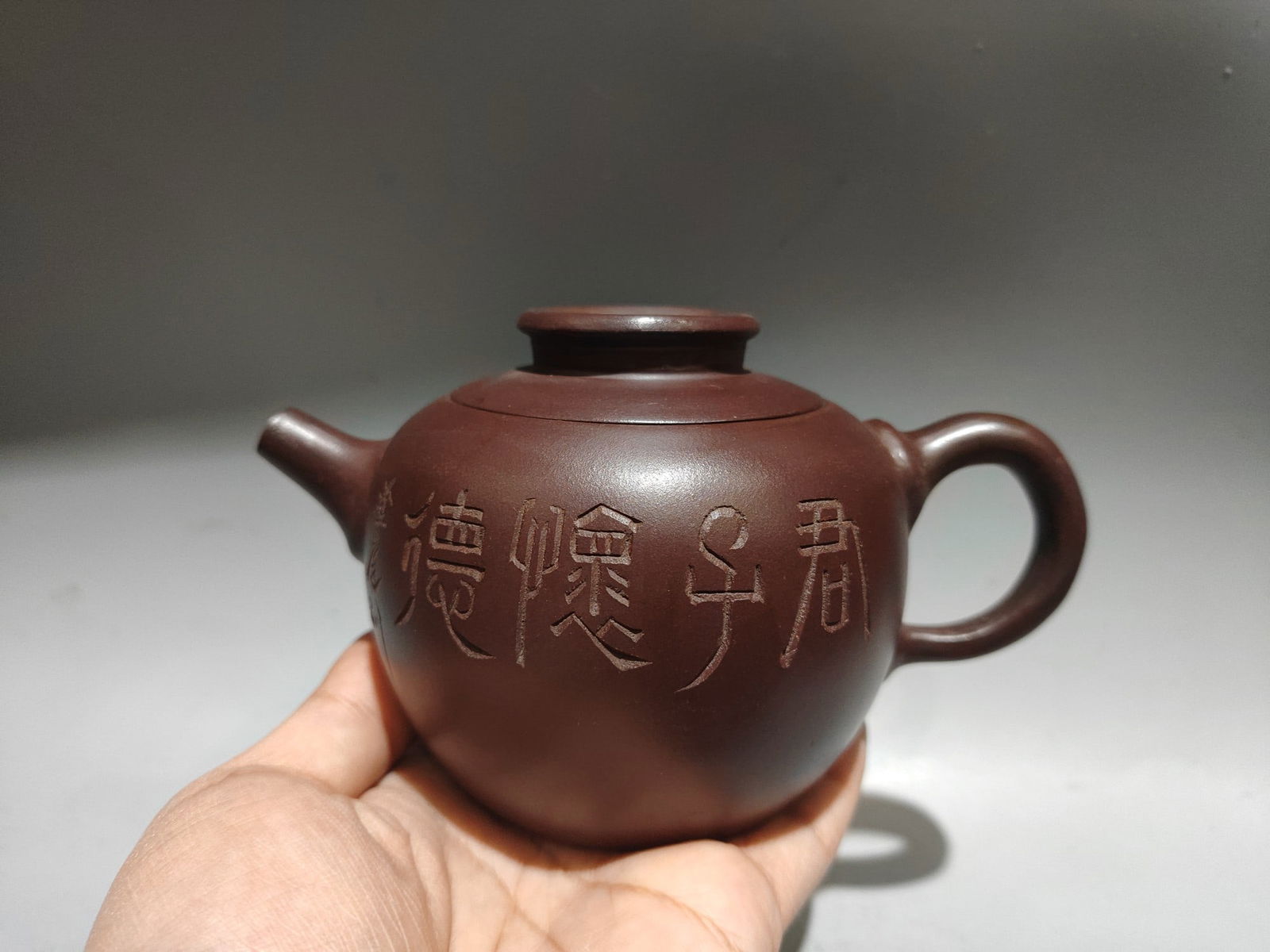 Name: Tai Chi Kettle: Name: Tai Chi Teapot; Bottom Mark: Wang Yinchun; Size: 17 x 10 cm; Capacity: 320 cc; Clay: Original Old Purple Clay Provenance:Private collection from a professor in Paris-Saclay University. Our coope