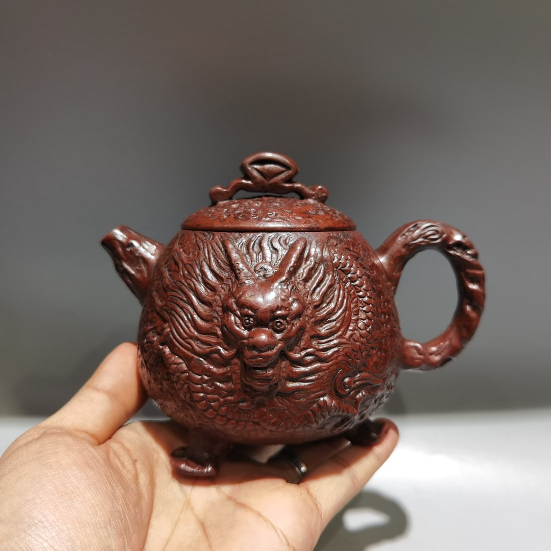 Name: Three-Legged Dragon Egg Pot: Name: Three-Legged Dragon Egg Teapot Base Mark: Xu Rulei Size: 14 x 11 cm Capacity: 360cc Clay: Original Red Clay Provenance:From a noted private collection in Aix-en-Provence, France. Our cooperative