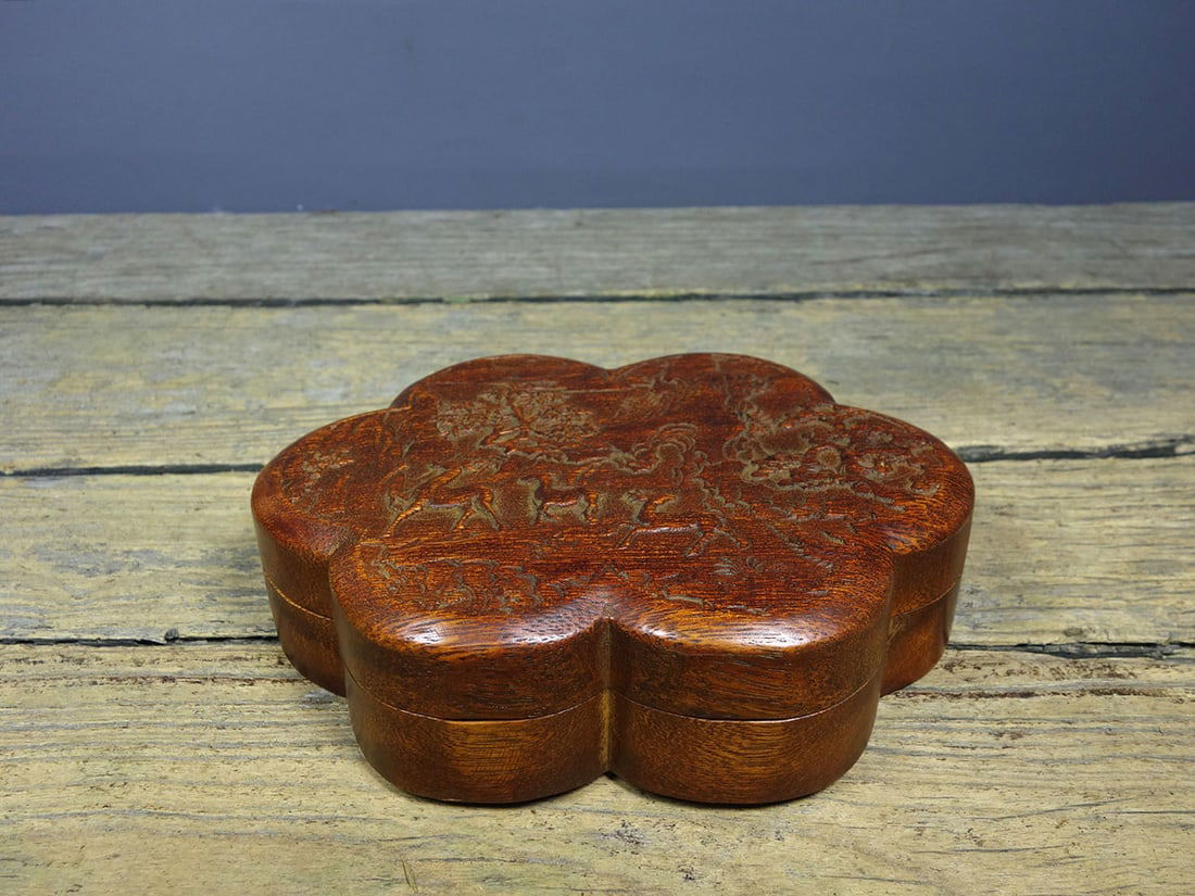 Old collection rosewood carved box containing seven thumb rings (1 of 9)