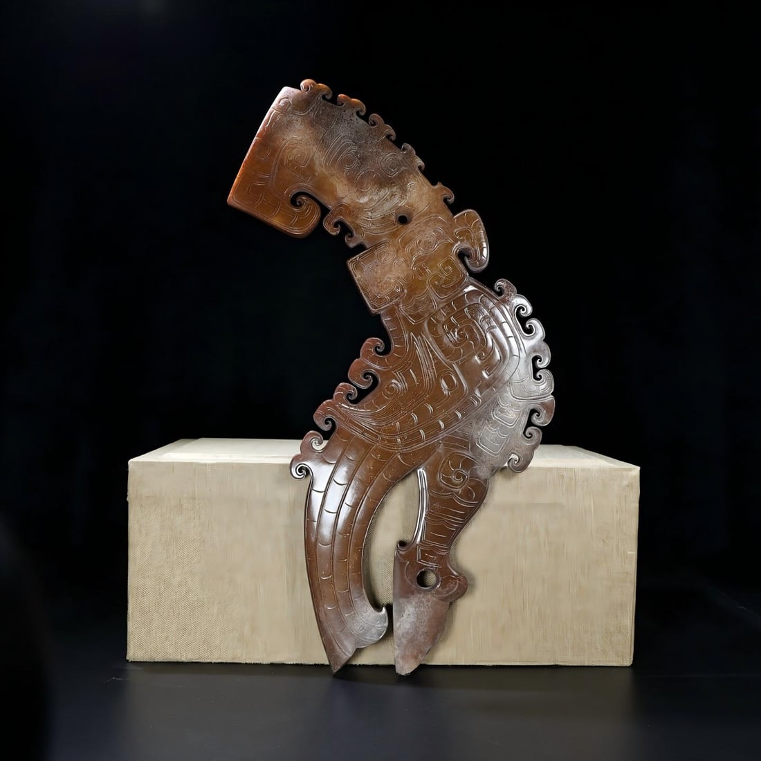 Exquisite antique piece, a large-scale Hetian jade ornament with full infiltration of black birds: Exquisite piece from a private collection. A large piece of Hetian jade, unearthed and fully inlaid with a black bird motif. The patina is thick and deep, the color penetrating to the bone. The