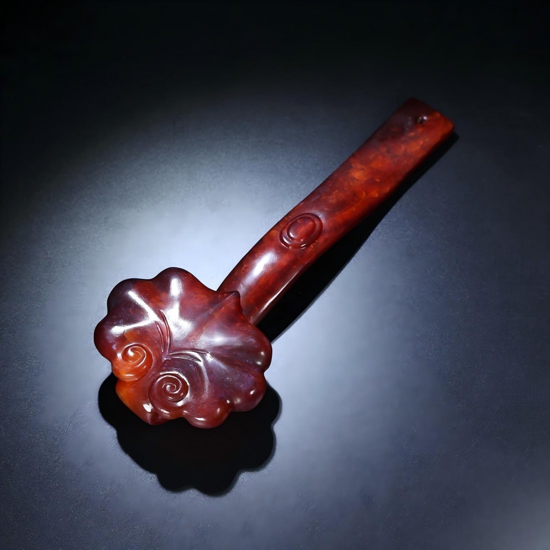 Exquisite antique, Hetian jade ruyi: This exquisite, antique Hetian jade ruyi scepter boasts a thick, deep patina and rich, penetrating color. The craftsmanship is superb, with sharp, precise carving. A rare and exceptional piece from a