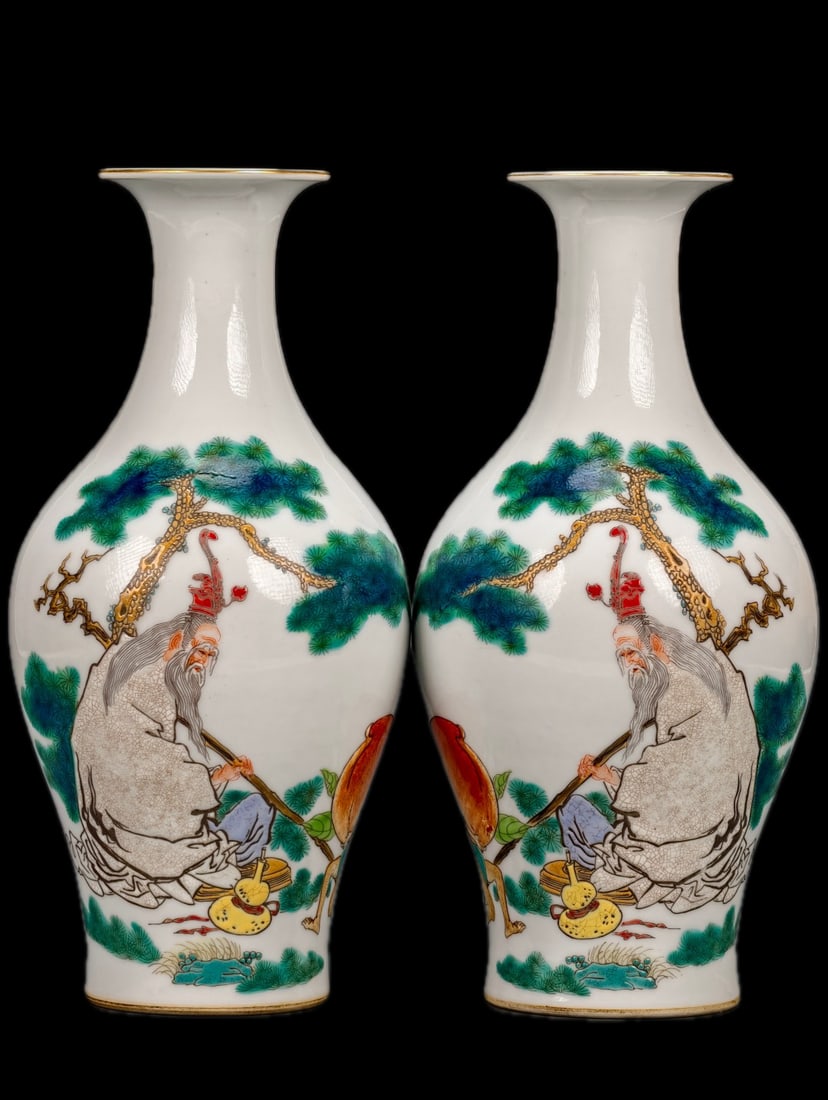 A pair of exquisitely crafted, fully decorated famille rose vases bearing the inscriptions "Made in (1 of 9)