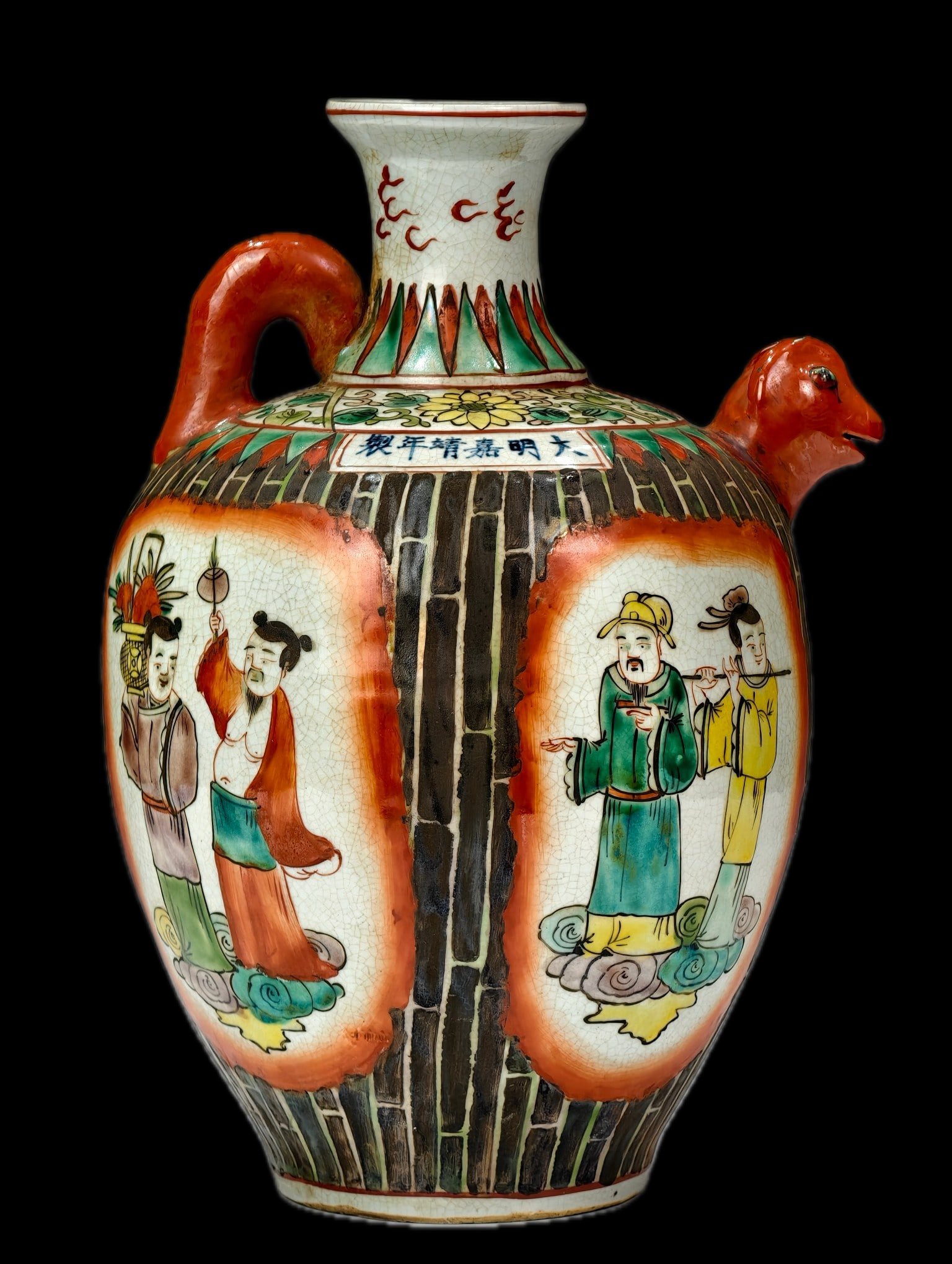 A polychrome ewer with four-sided windows and the Eight Immortals motif, made during the Jiajing: The Jiajing and Wanli periods represent the peak of polychrome porcelain development, with exceptionally dazzling polychrome paintings on various forms. The ewer pictured here is fully decorated with