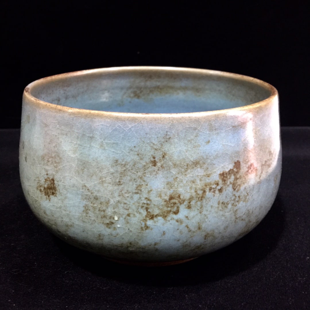 A Song Dynasty Jun porcelain bowl with a patina that has been passed down through generations. (1 of 7)