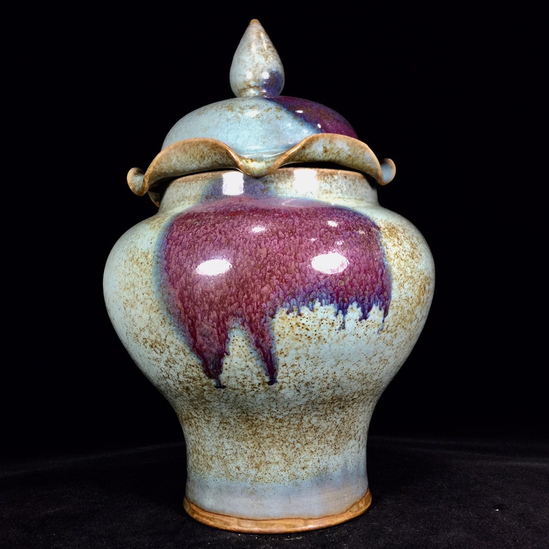 A Song Dynasty Jun ware lotus leaf jar with a patina that has been passed down through generations. (1 of 9)