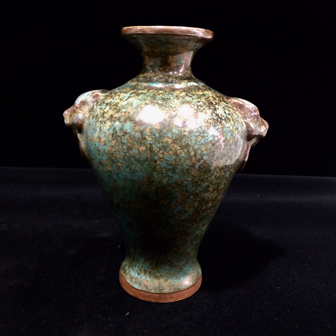 A Song Dynasty Jun ware blue-glazed plum vase with gold flecks, its surface patinated with age. (1 of 7)