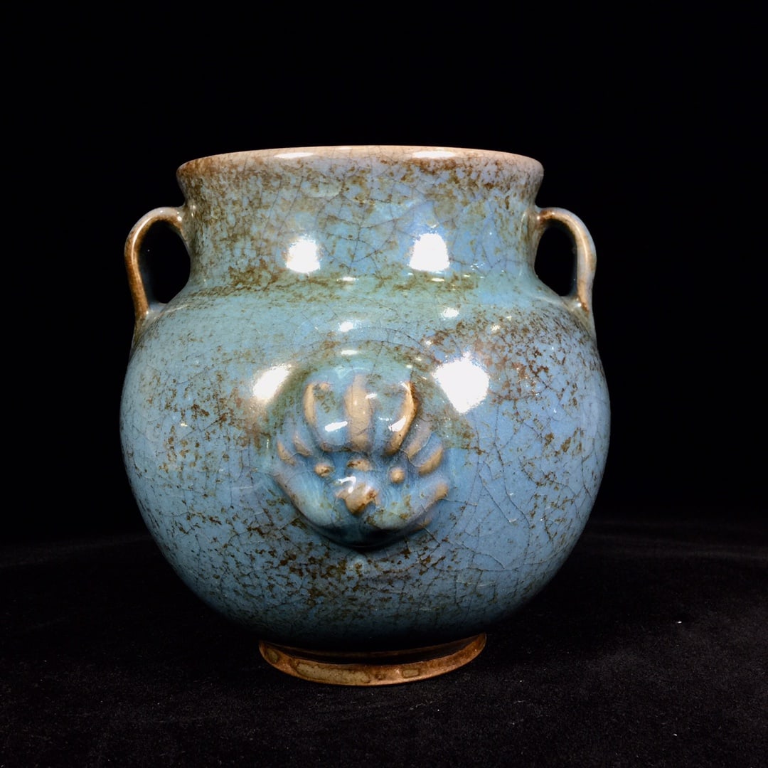 A Song Dynasty Jun ware double-handled jar with a rich, aged patina. (1 of 9)