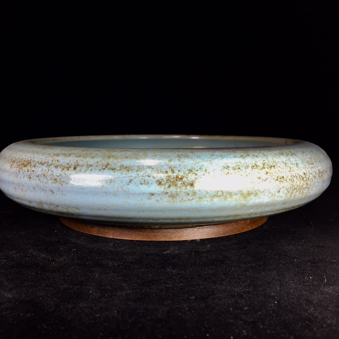 A Song Dynasty Jun ware round washer with a patina that has been passed down through generations. (1 of 9)