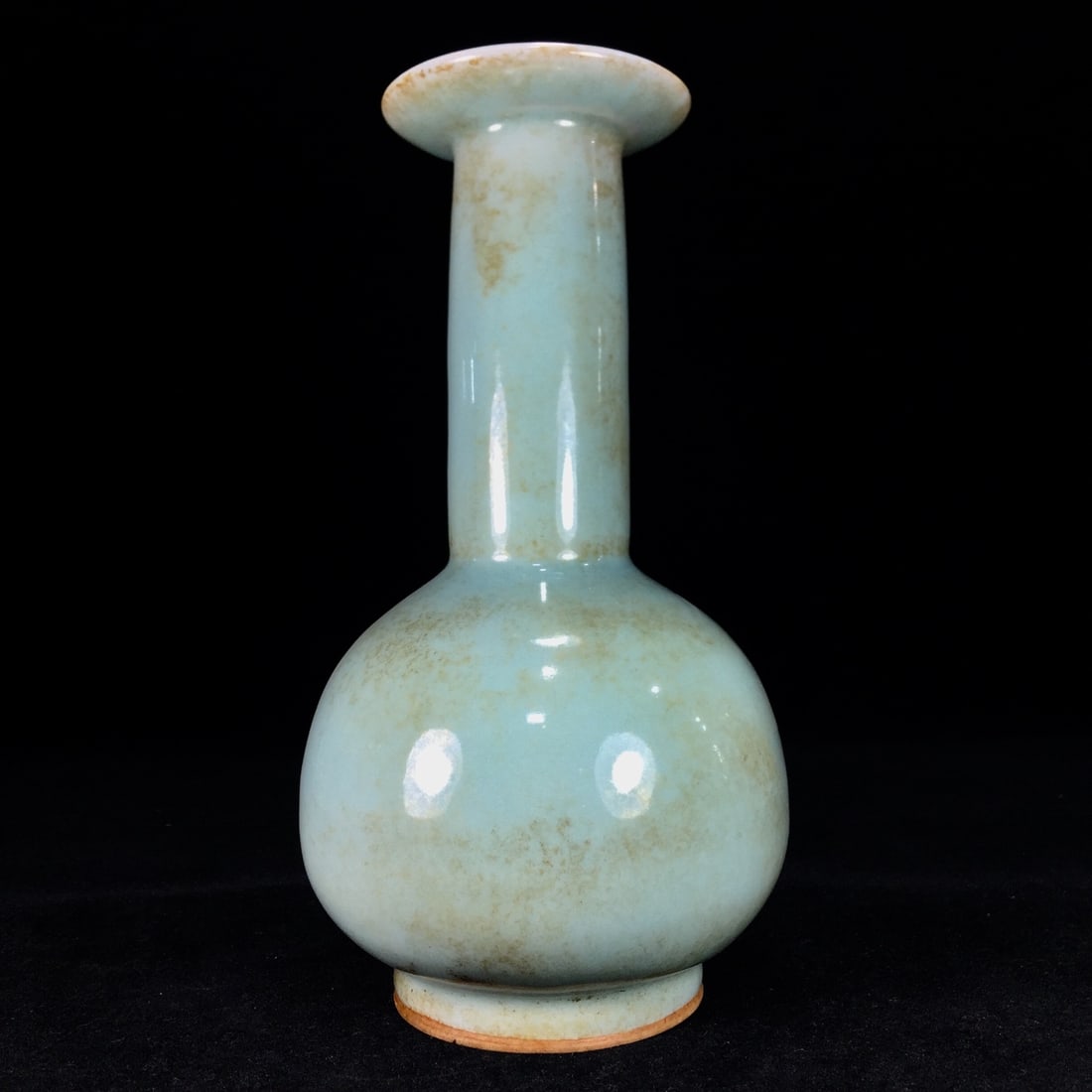 A Song Dynasty Longquan porcelain vase with a layer of patina, passed down through generations. (1 of 9)