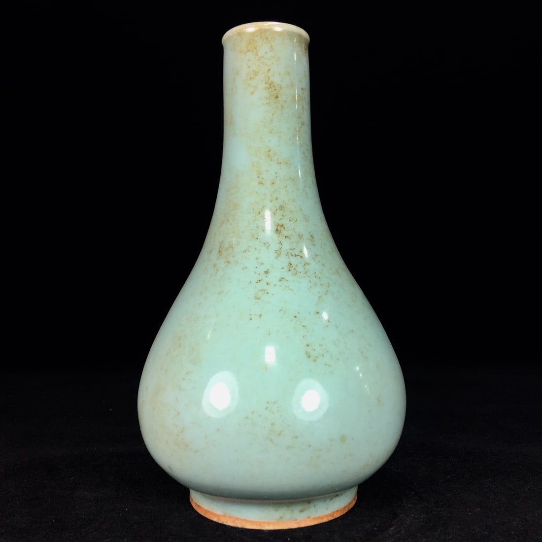 A Song Dynasty Longquan celadon teardrop vase with a patina that has been passed down through (1 of 9)