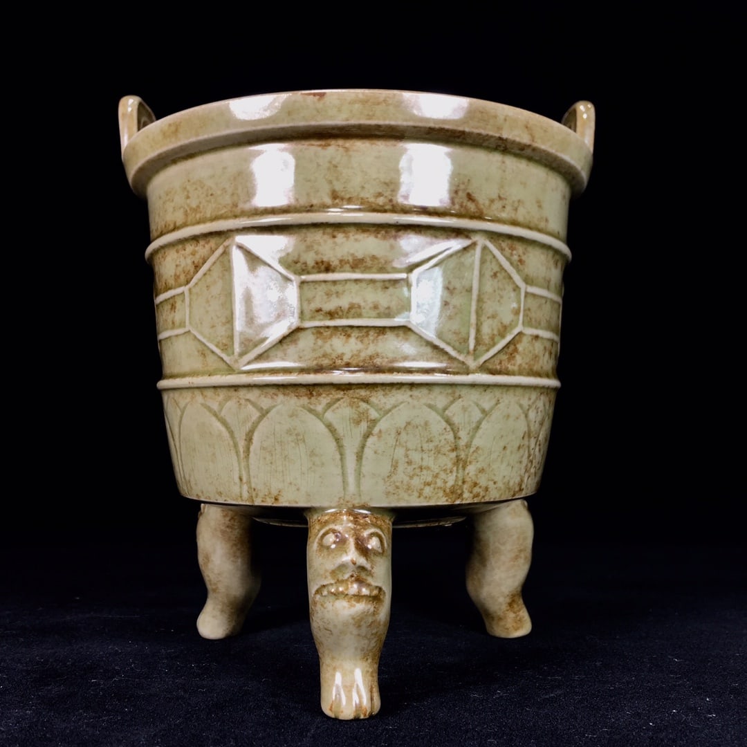 A Song Dynasty Yue ware porcelain incense burner with a patina developed over time. (1 of 9)