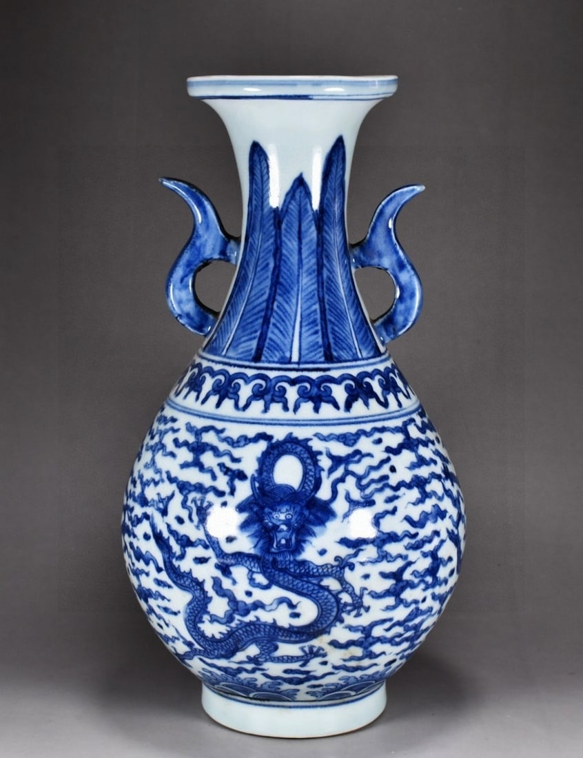 Blue and white porcelain vase with dragon and cloud design and ruyi-shaped handles, made during the (1 of 9)