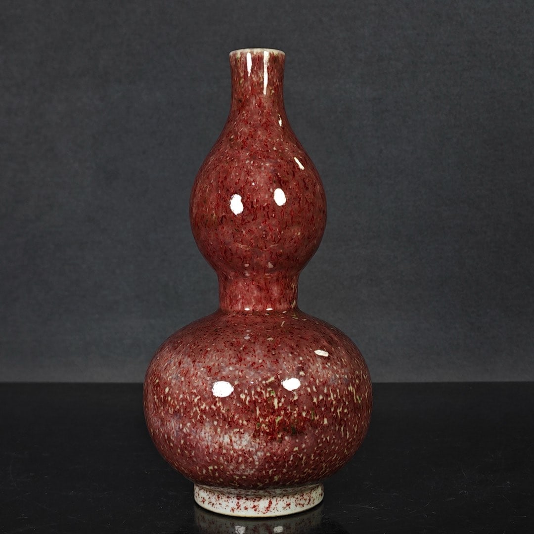 A vase with a peach-bloom red kiln-transformed design depicting a drunken beauty, made during the (1 of 7)