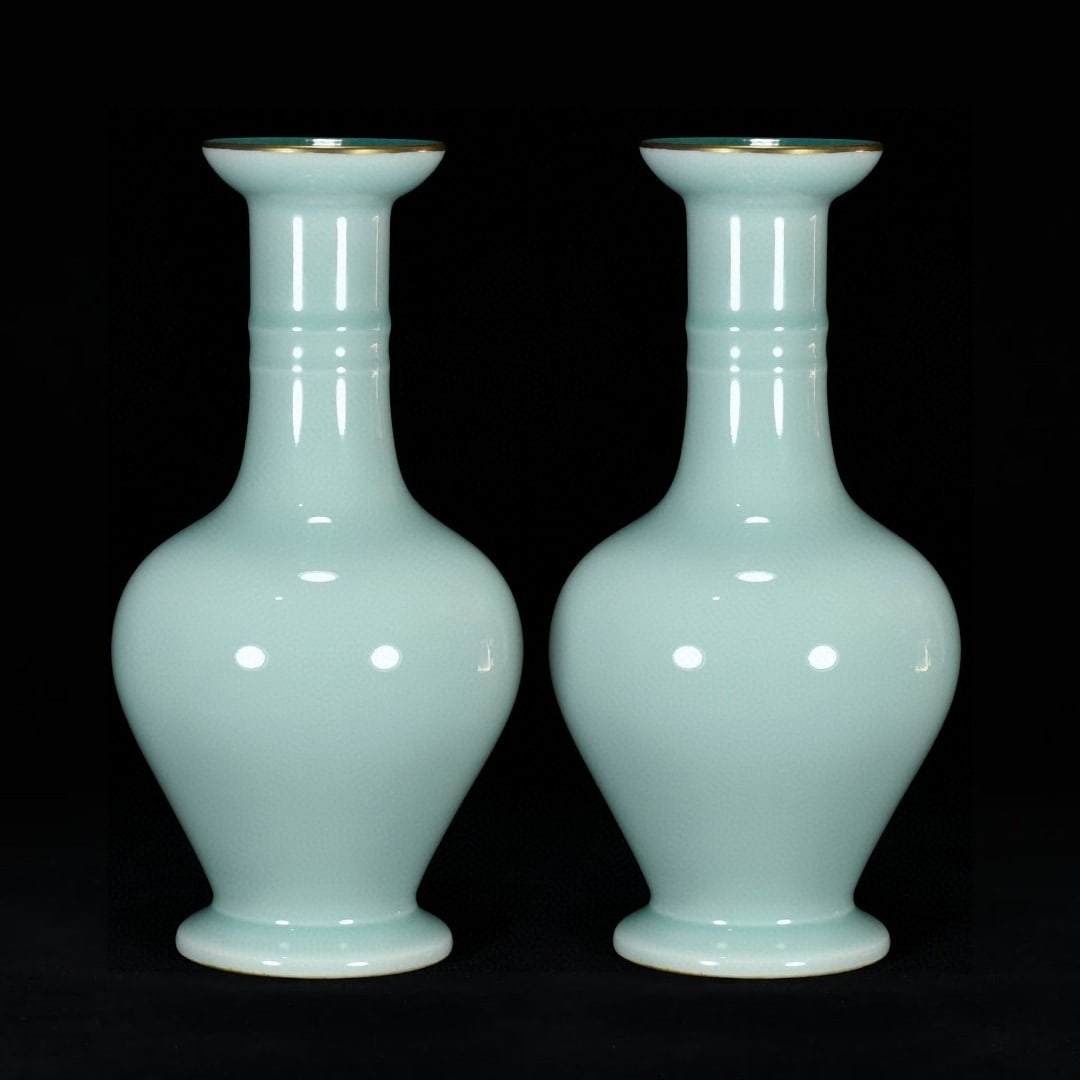 A celadon-glazed vase with a gilded mouth and neck made during the Qianlong reign of the Qing (1 of 9)