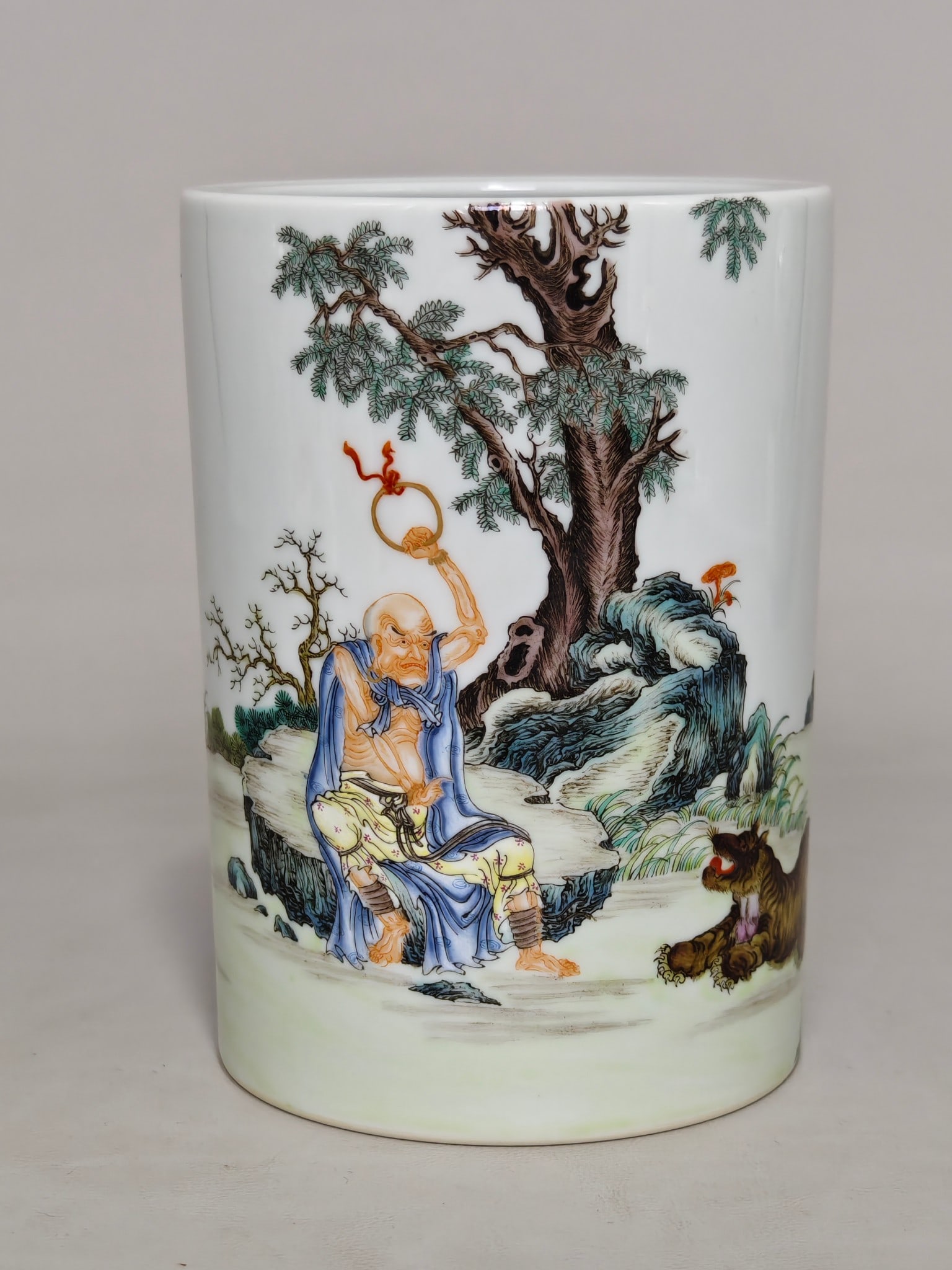 A famille rose brush pot with a design of a tiger and a arhat, made during the Qianlong reign of the (1 of 9)