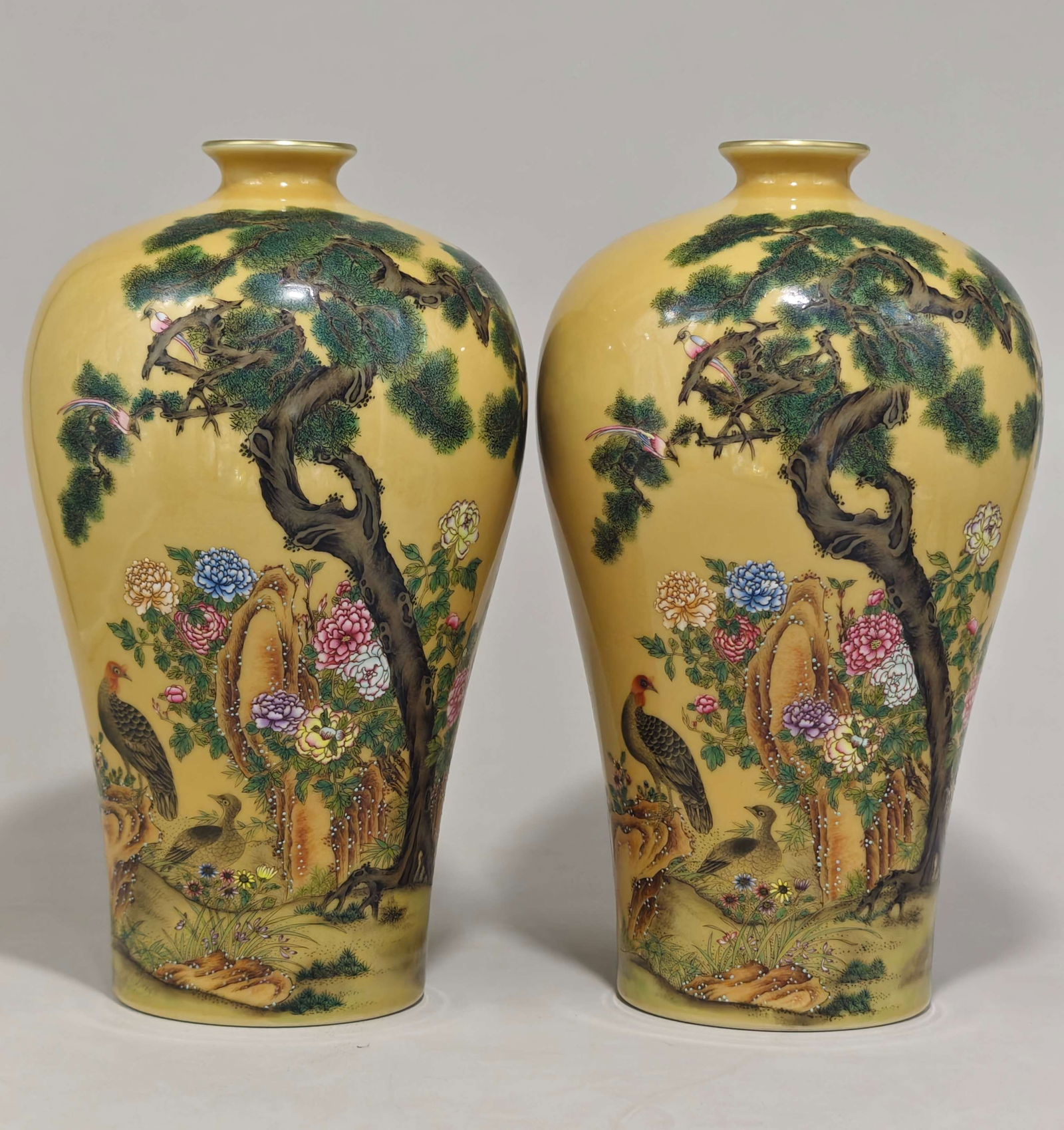 A pinkish-yellow glazed plum vase with a floral design and the mark of the Qianlong reign of the (1 of 9)