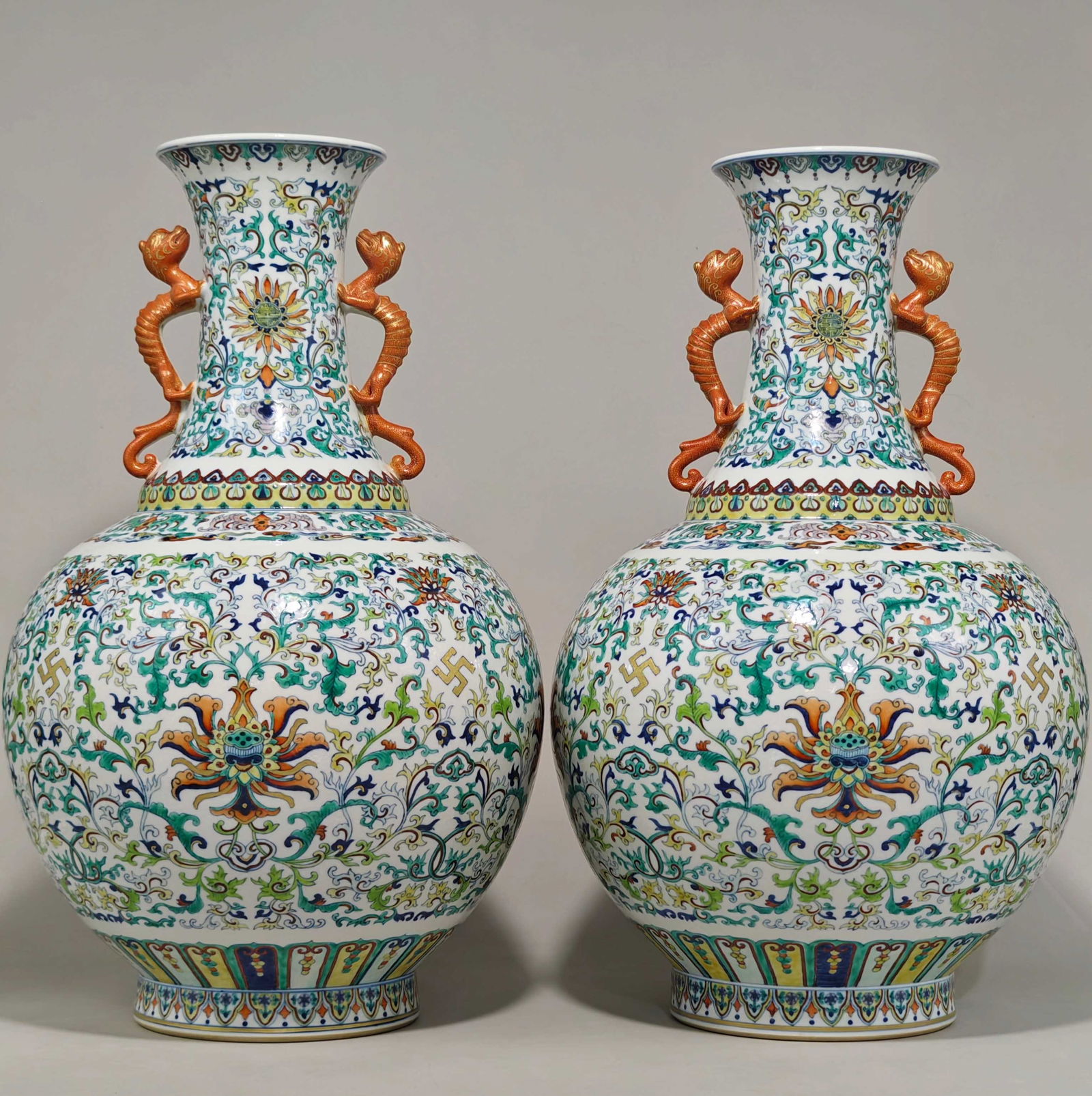 Blue and white doucai vase with lotus scroll design, made during the Qianlong reign of the Qing: A blue-and-white doucai vase with lotus scroll design, bearing the mark of the Qianlong period of the Qing Dynasty, measuring 52 cm in height and 33 cm in diameter. Provenance:Private collection from