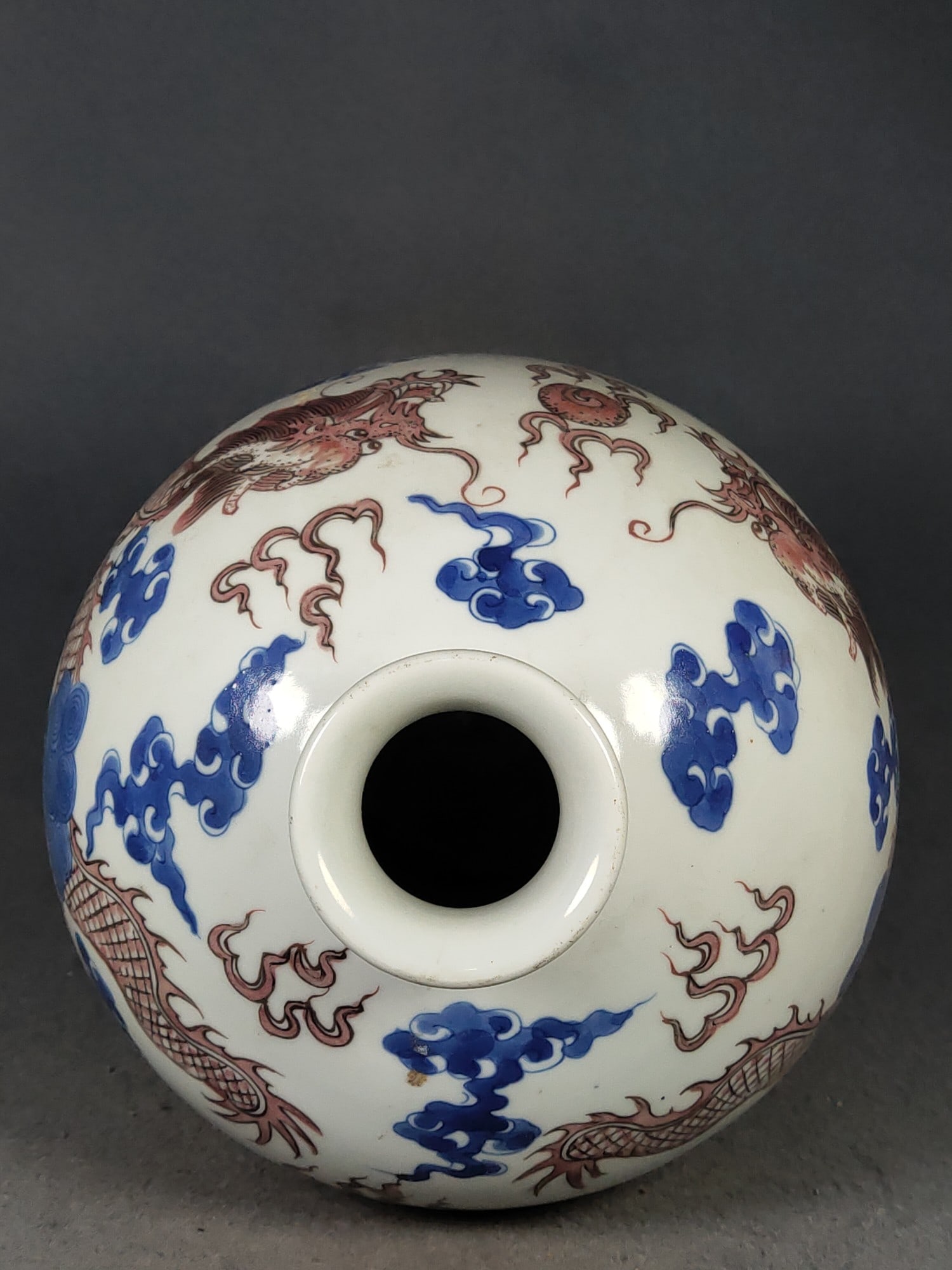 Blue and white underglaze red plum vase with dragon and cloud design, made during the Qianlong - 2