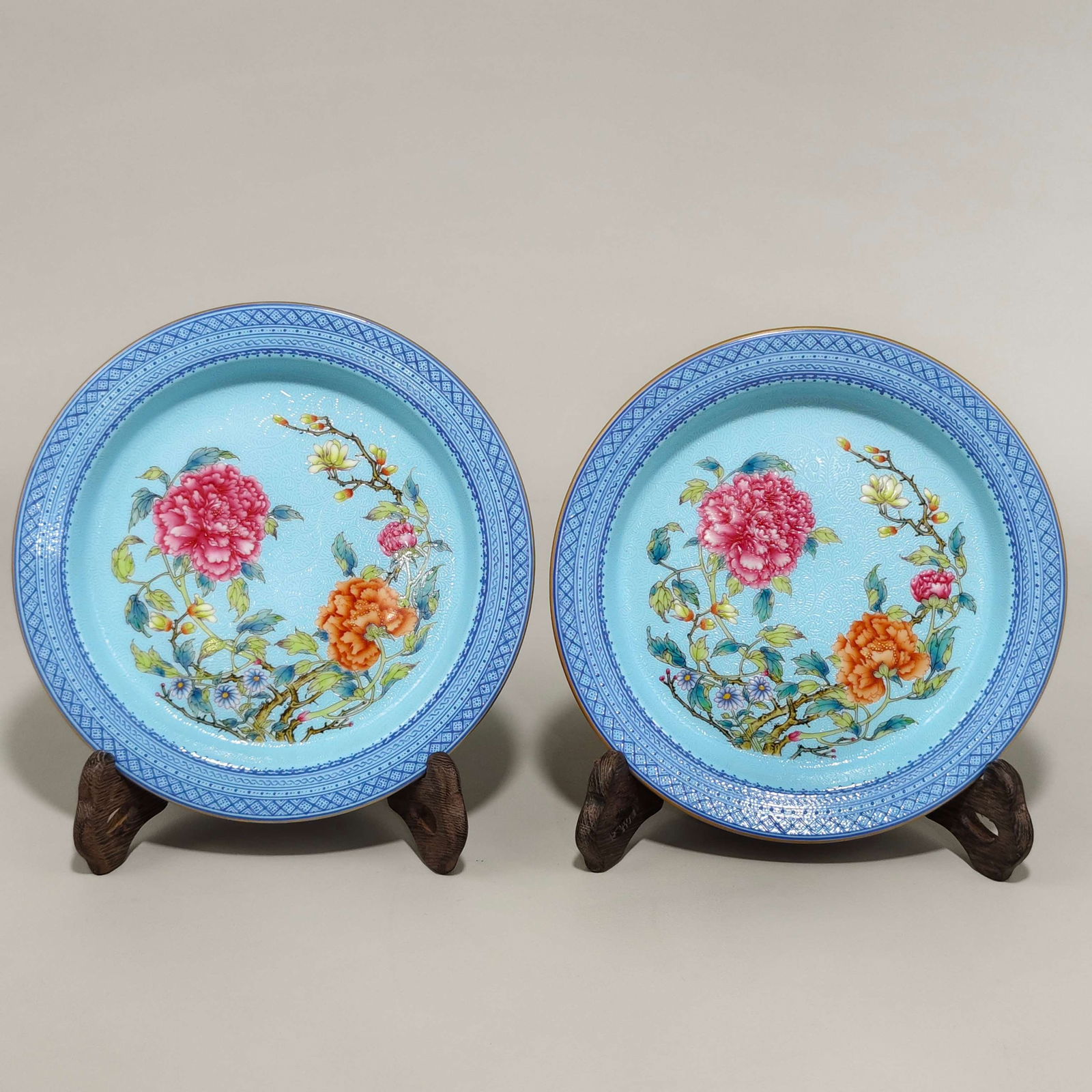 Qing Dynasty Qianlong Imperial Enamel Teapot Stand with Auspicious and Prosperous Design: A Qing Dynasty Qianlong Emperor's Imperial Enamel Teapot Stand with a "Prosperity and Wealth" Design, 2.5 cm high and 17 cm in diameter. Provenance:Private collection from a professor in ESC Rennes