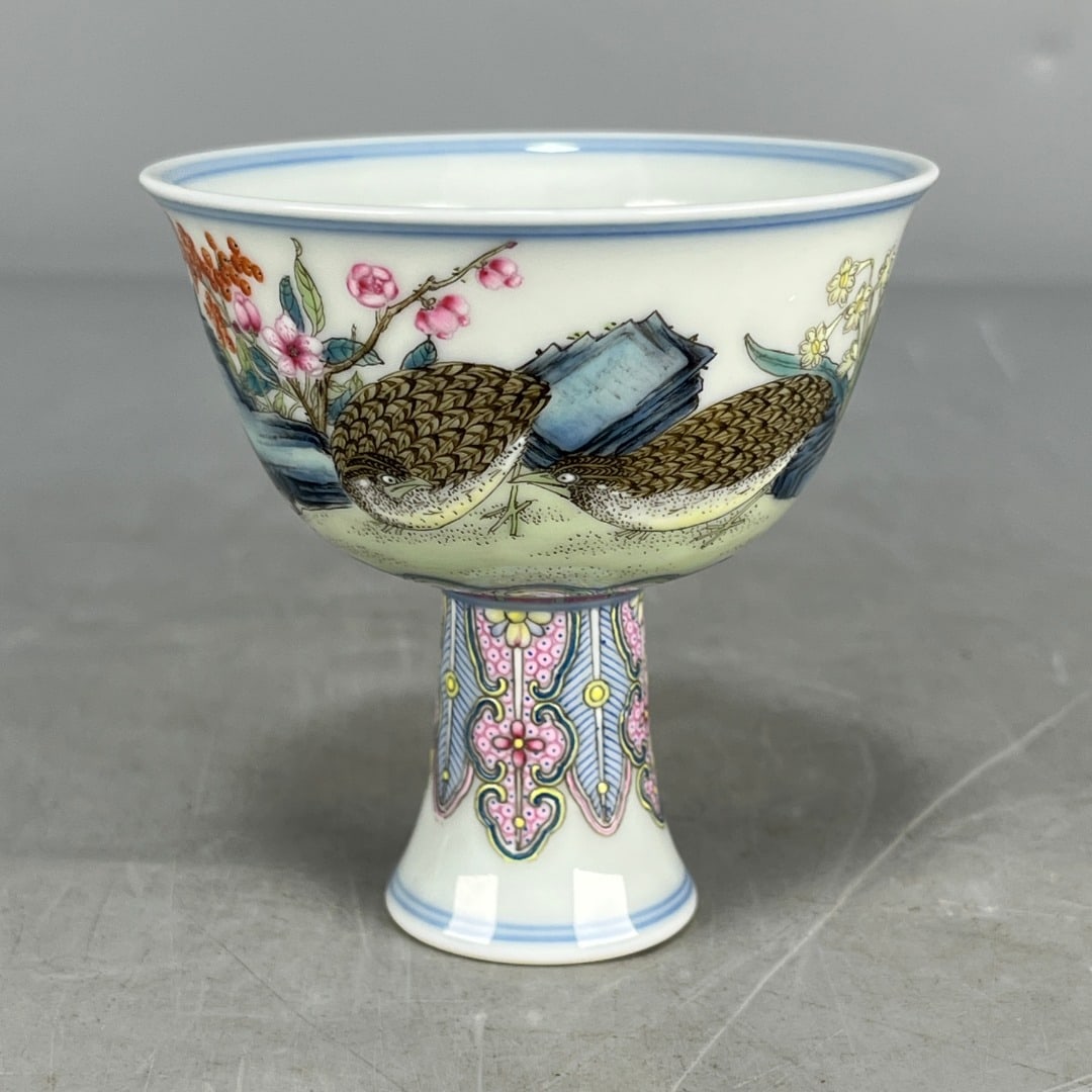 A famille rose stem cup with a design of "Peace and Prosperity" made during the Yongzheng reign of: A famille rose stem cup with a design of "Peace and Prosperity" made during the Yongzheng reign of the Qing Dynasty. Provenance:From a private collection in Sussex, United Kingdom. Our cooperative