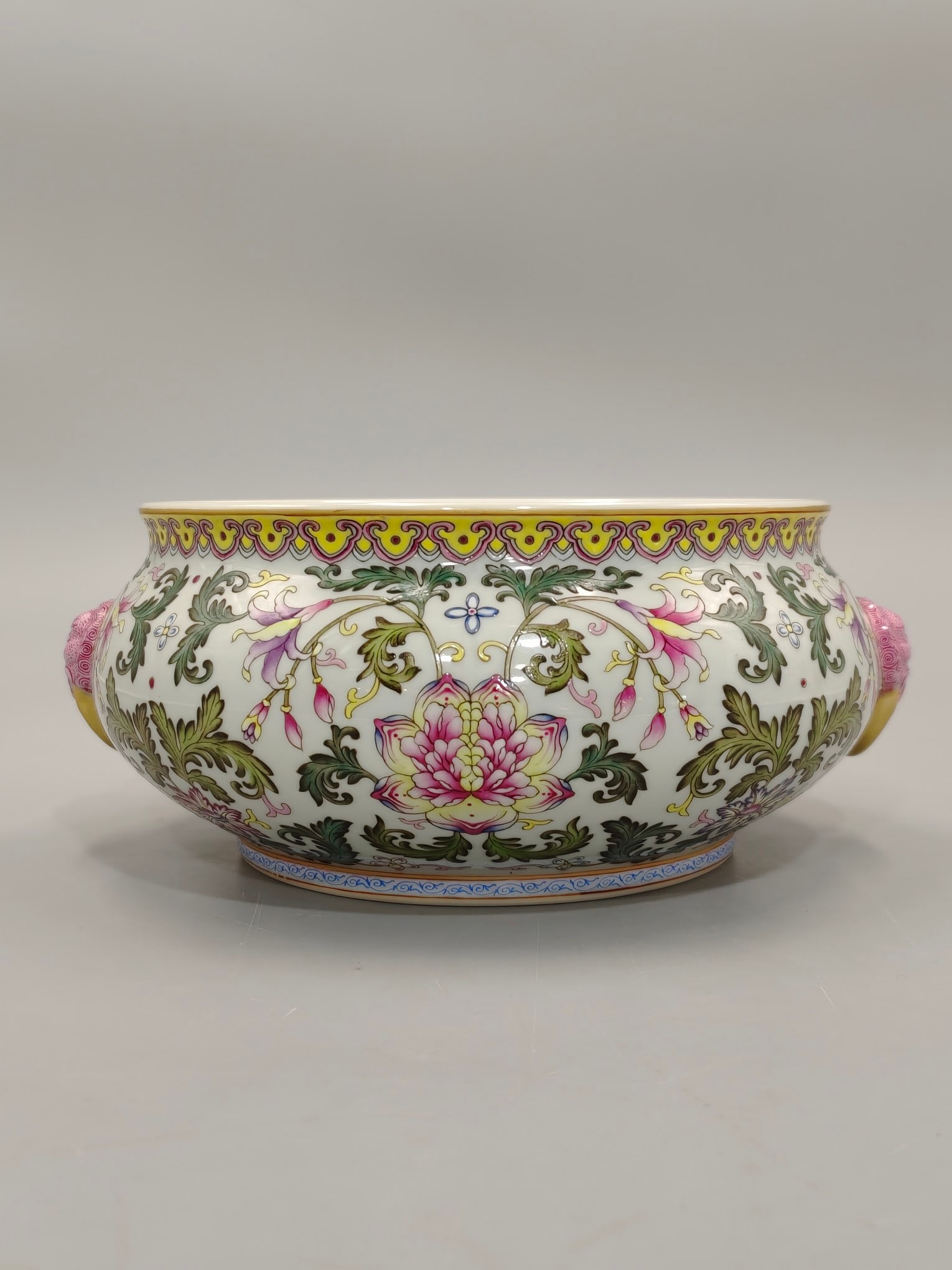 A famille rose lotus scroll with lion-ear handles, painted with exquisite craftsmanship. (1 of 9)