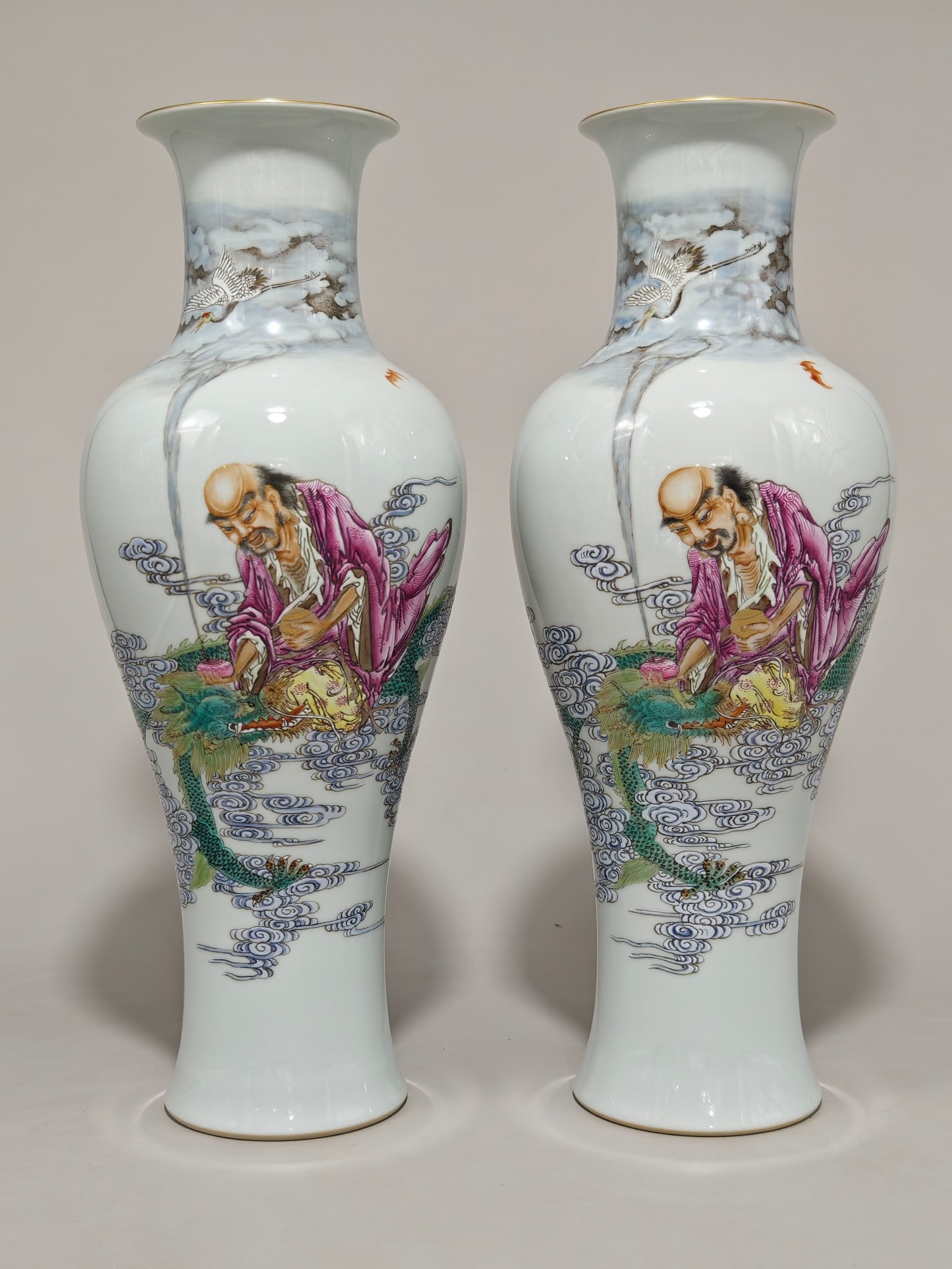 A famille rose fish-tail vase with dragon and arhat motif, bearing the mark of the Yongzheng reign (1 of 9)