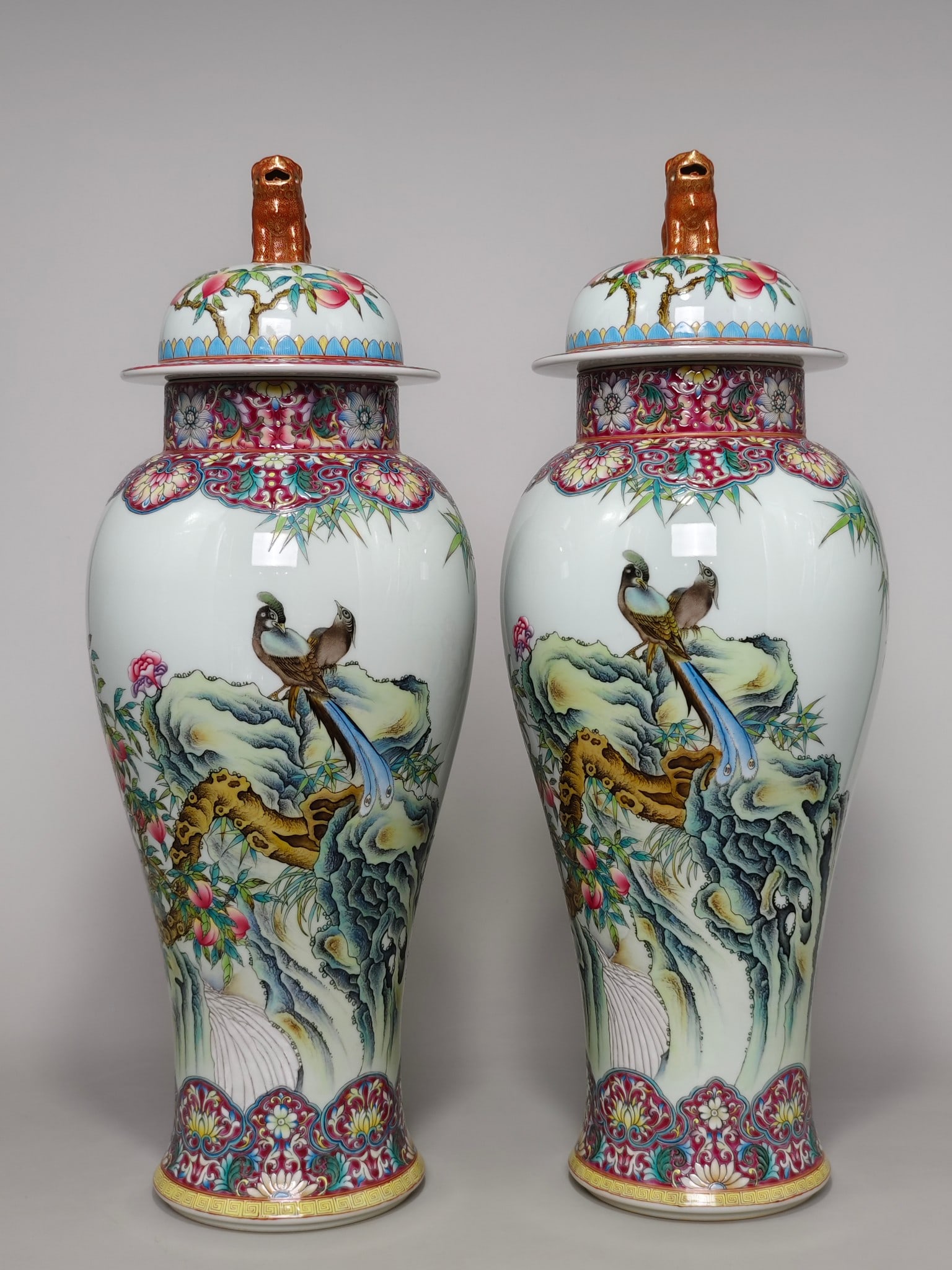 A covered jar with enamel decoration and a design of double blessings of happiness and longevity,: A covered jar with enamel decoration and a design of double blessings of happiness and longevity, bearing the mark of the Yongzheng period of the Qing Dynasty. It measures 52 cm in height and 18 cm