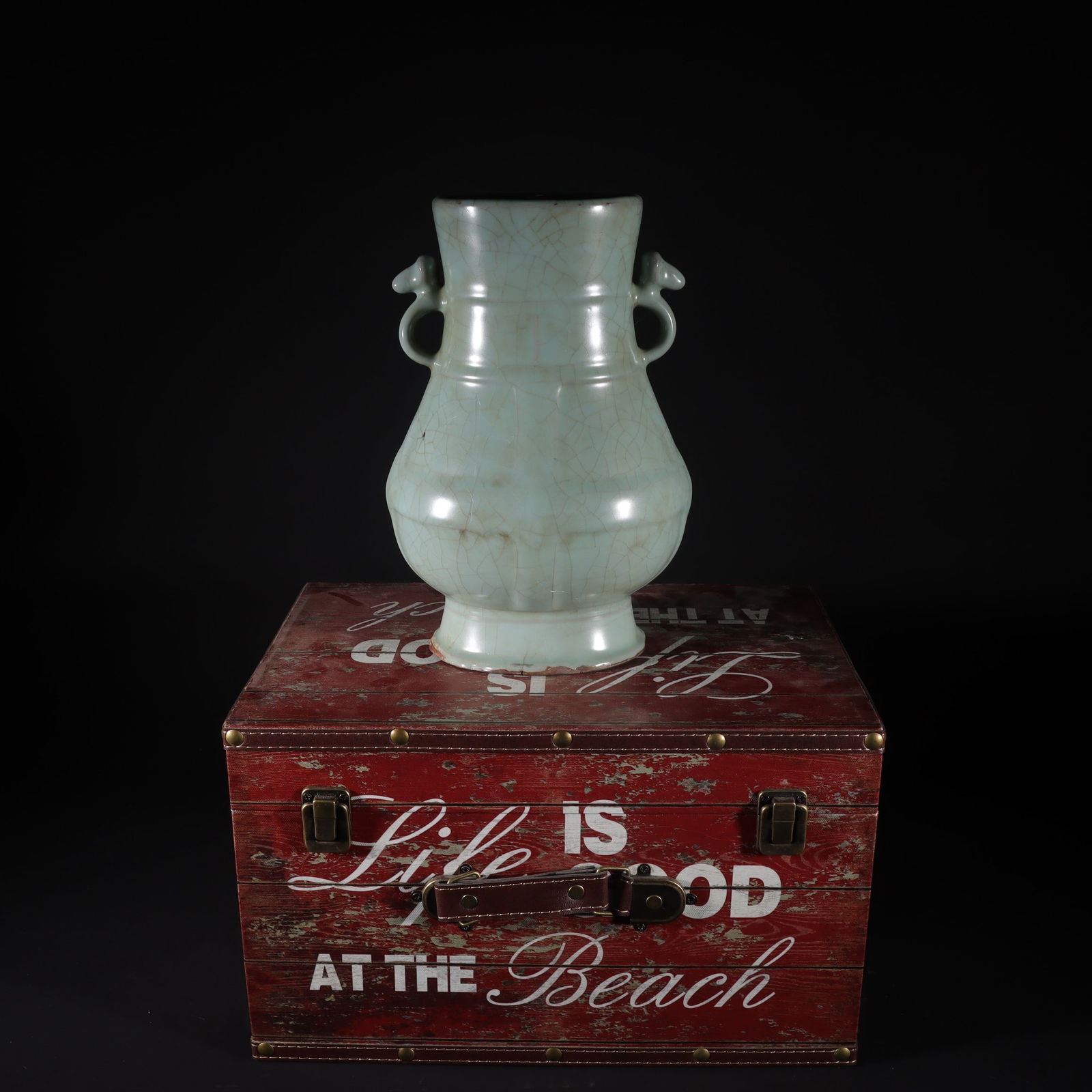 Song Dynasty Official Kiln Celadon Glazed Sheep-Ear Vase: A Song Dynasty official kiln celadon-glazed vase with ram-ear handles, measuring 27.3 cm in height and 18.5 cm in width. Provenance:Private collection, Roma, Italy. Our cooperative logistics services