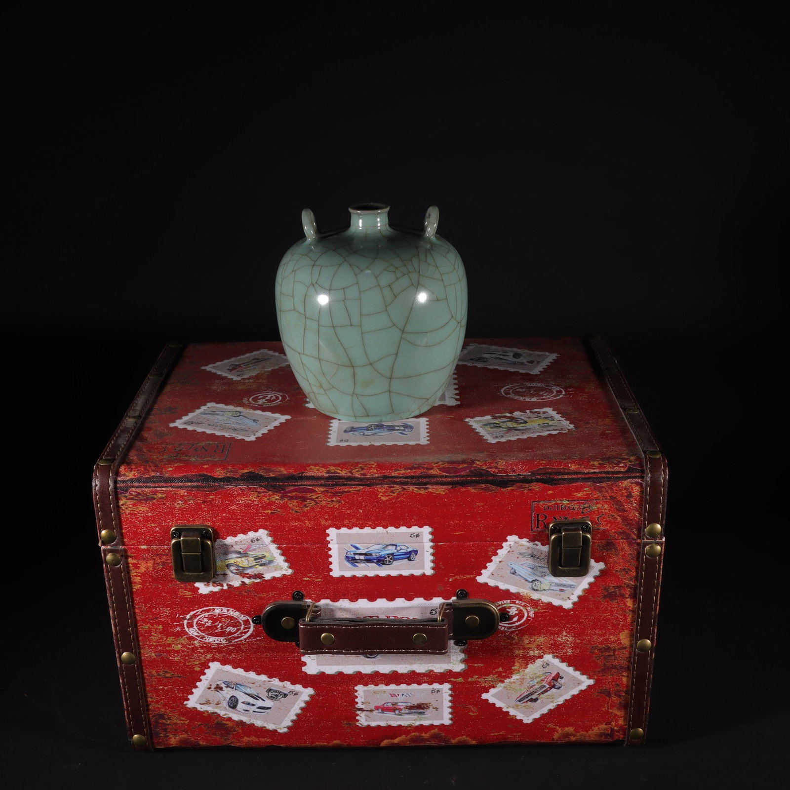 Song Dynasty official kiln celadon double-handled jar: A Song Dynasty official kiln celadon double-handled jar, 13.5cm high and 13cm wide. Provenance:Private collection, Roma, Italy. Our cooperative logistics services provider expertly handles both