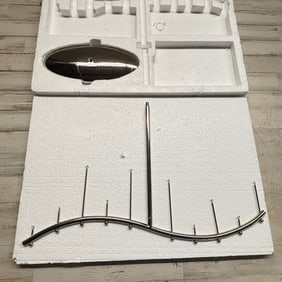 Crate & Barrel ornament centerpiece designed to display up to ten hanging ornaments.