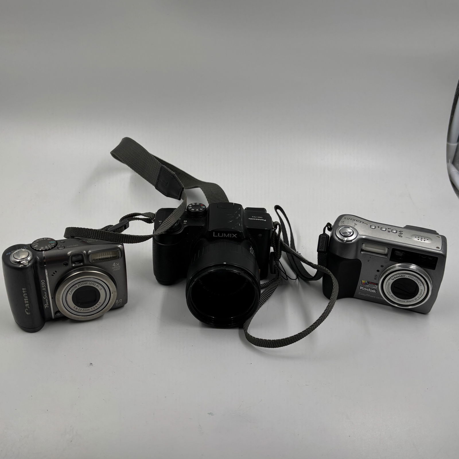 Group of Three Digital Cameras: Canon PowerShot A590 IS, Panasonic Lumix DMC-FZ5, and Kodak (1 of 18)