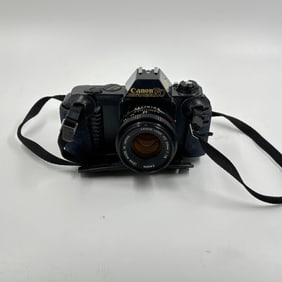 Canon T50 35mm Film SLR Camera with Canon FD 50mm f/1.8 Lens