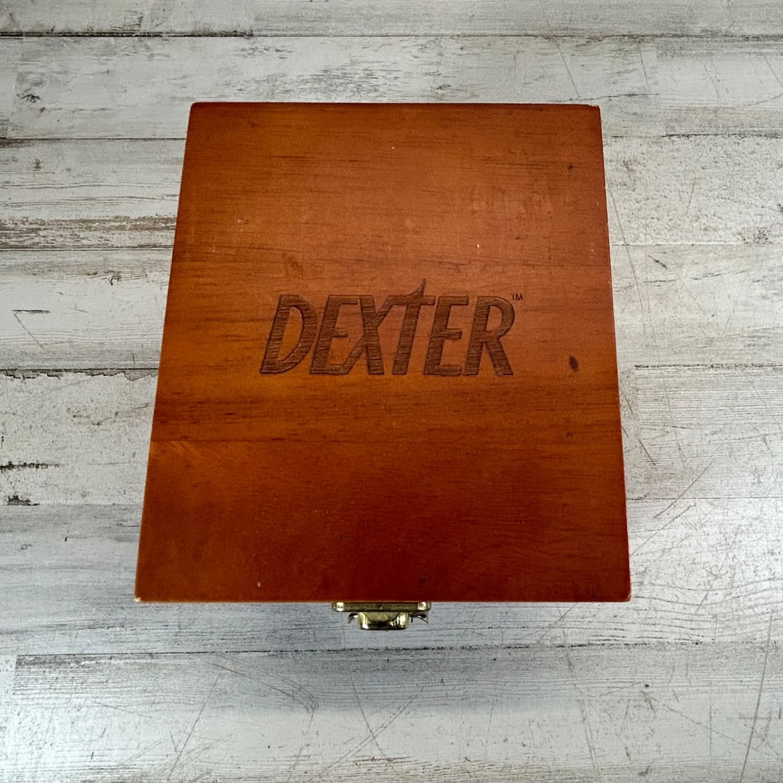 Dexter "Blood Splatter" Coaster Set Wood Box 6 Glass Barware Collectible: Impress your guests or add a unique touch to your bar with this "Dexter" themed coaster set. The set includes six square glass coasters, each featuring a realistic red blood splatter design, presented