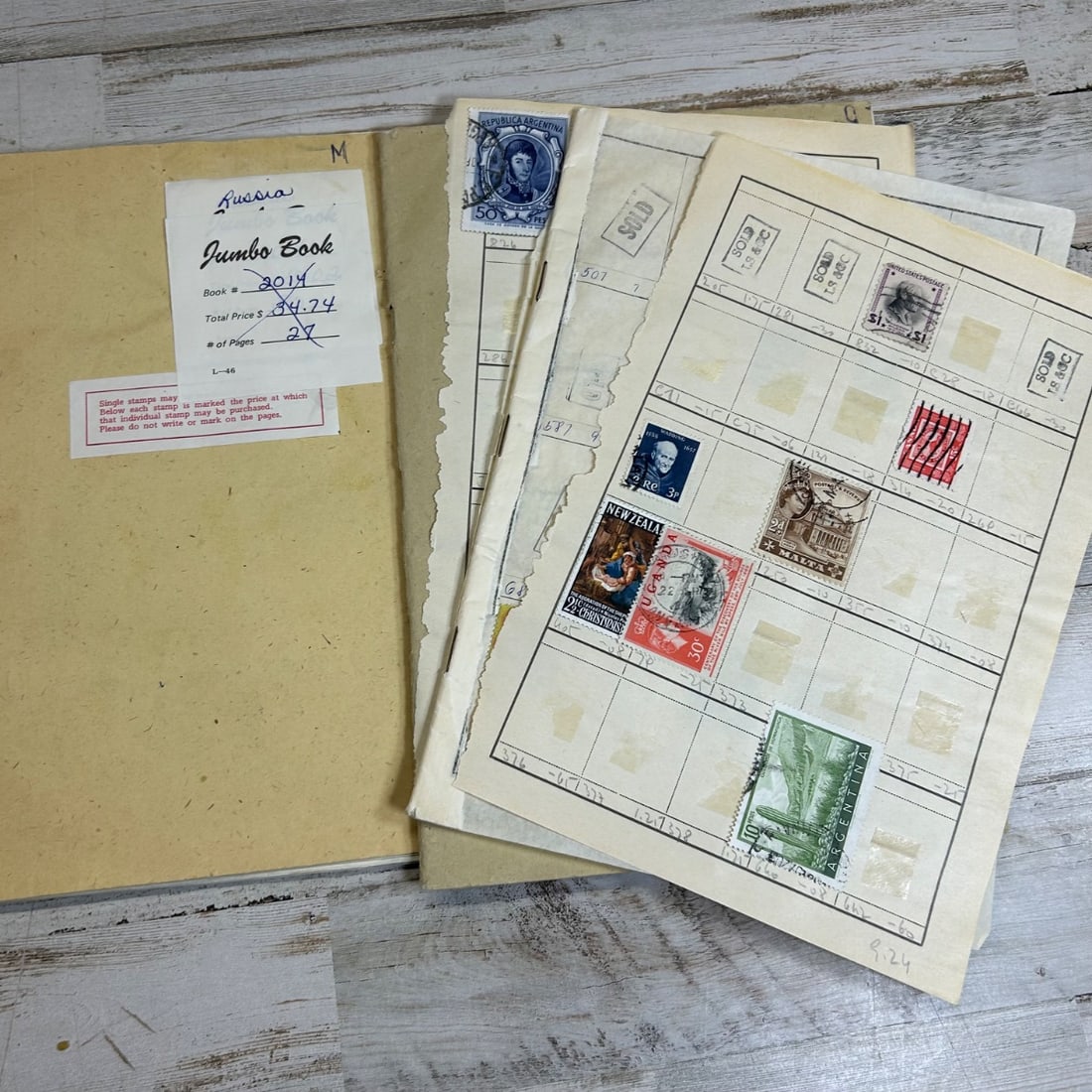 Russia & International Stamp Collection "Jumbo Book" - Mystic Stamp Co.: A substantial "Jumbo Book" stamp album from Mystic Stamp Company, primarily featuring stamps from Russia (USSR) and some international issues, including Danish stamps. The pages are filled with an arr