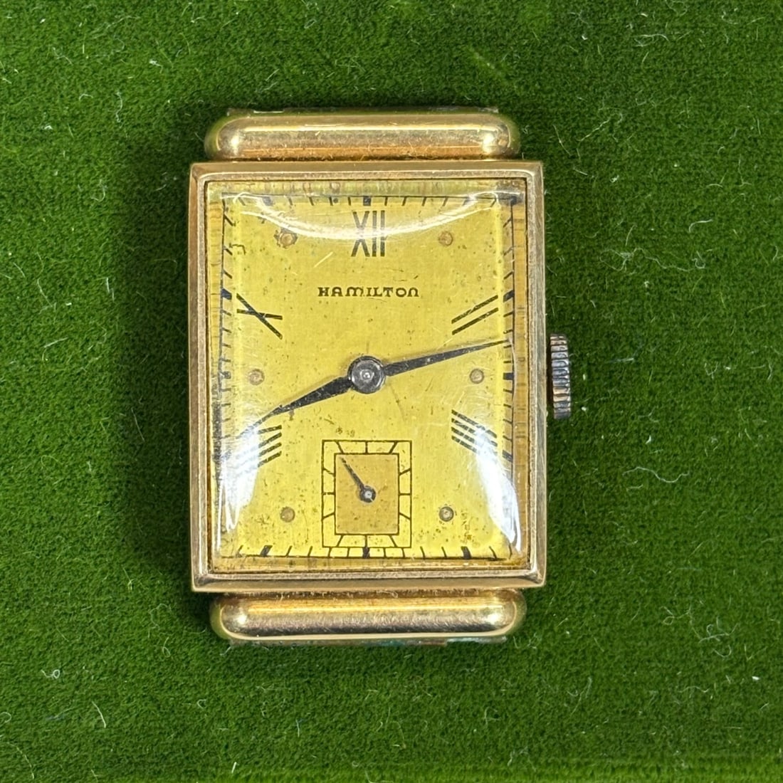 Vintage Hamilton 14K Gold Filled Rectangular Men's Watch Sub-Second Dial Art Deco: This vintage Hamilton wristwatch for men features a classic rectangular case with elegant lugs, indicative of the Art Deco era. The champagne dial displays Roman numerals for XII and baton markers for
