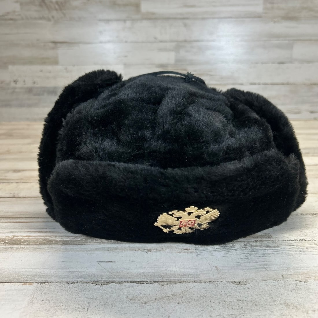 Black Faux Fur Ushanka Hat Russian Double Headed Eagle Emblem Winter Trapper: This classic black faux fur Ushanka hat is a warm and stylish winter accessory, perfect for cold climates. It features traditional ear flaps that can be tied up at the crown or fastened at the chin fo