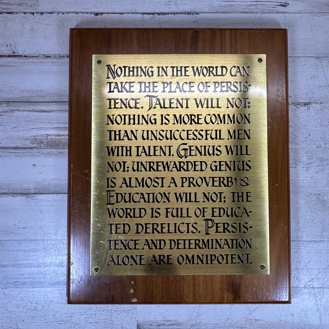 Vintage Wood Plaque with Brass Quote - "Persistence & Determination": This vintage motivational plaque features a brass plate with an engraved quote attributed to Calvin Coolidge (often misattributed). The quote reads, 'Nothing in the world can take the place of persist