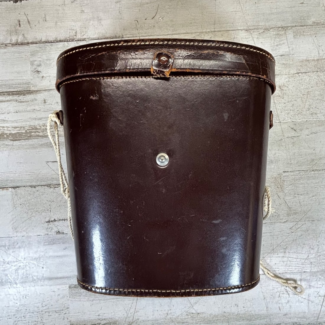 Leitz Wetzlar 7x50 Trinovid Binoculars w/ Leather Case & Strap: A vintage pair of Leitz Wetzlar 7x50 Trinovid binoculars in excellent condition, originating from Germany. These high-quality binoculars feature coated lenses for clarity and a robust build. They come