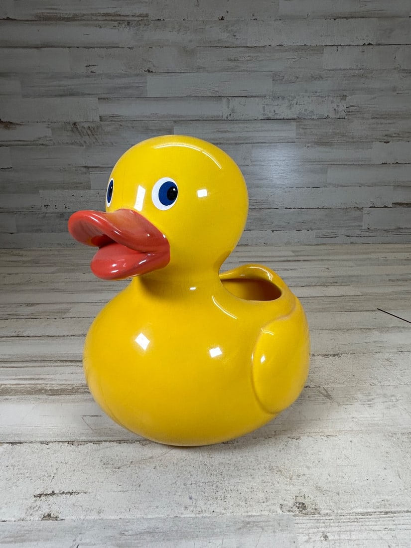 Vintage Yellow Ceramic Duck Planter Pot Whimsical Garden Decor: Charming vintage planter pot shaped like a cheerful yellow duck. This whimsical piece is perfect for adding a touch of fun to any garden, patio, or indoor space. Crafted from glazed ceramic, it featur