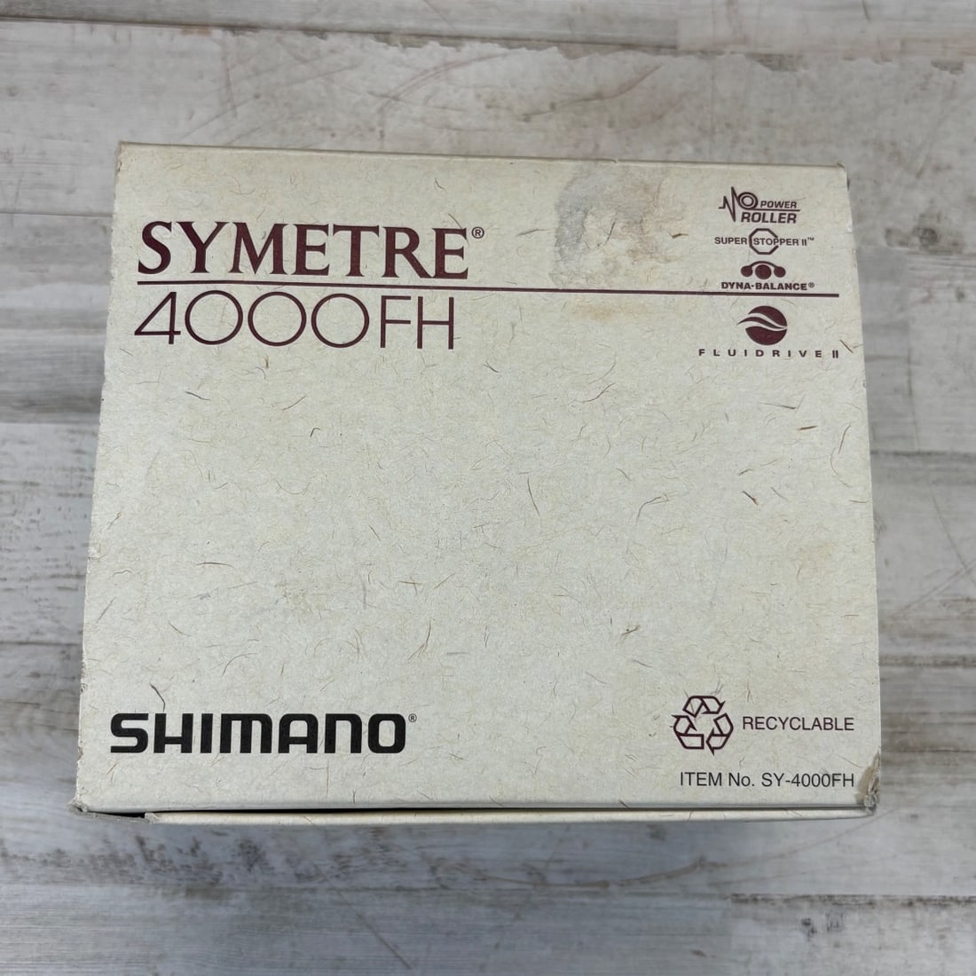 Shimano "Symetre 4000FH" Spinning Fishing Reel & Extra Spool Dyna-Balance: This listing features a Shimano Symetre 4000FH spinning fishing reel, known for its smooth operation and durability. It includes an additional 4000 size spool, offering versatility for different fishi